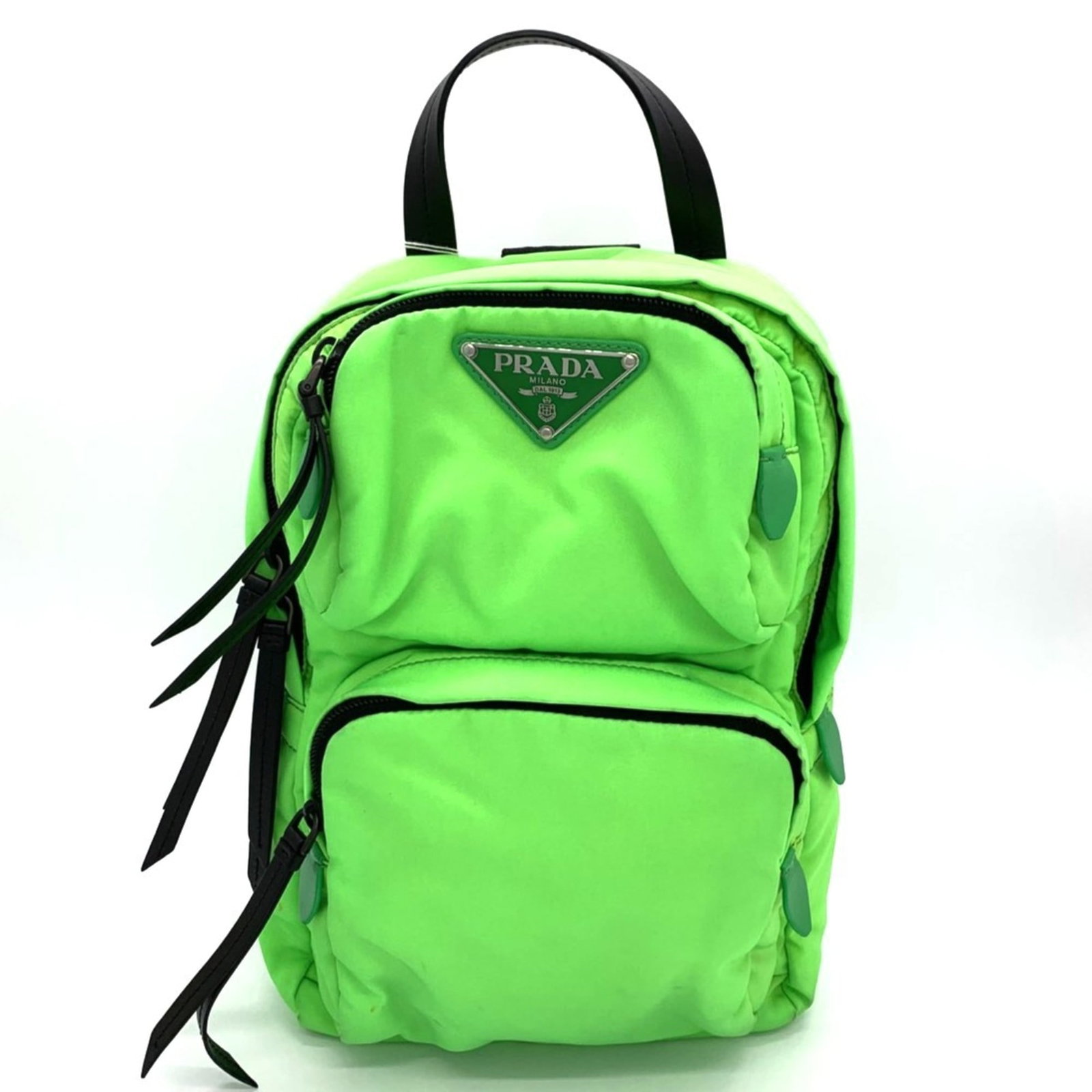 Nylon Prada Sling Bag: Nylon Prada Sling Bag The Prada Nylon Sling Bag boasts a vibrant green hue, adding a pop of color to any outfit. Made from high-quality nylon material, this stylish bag measures 30cm x 20cm x 11cm and