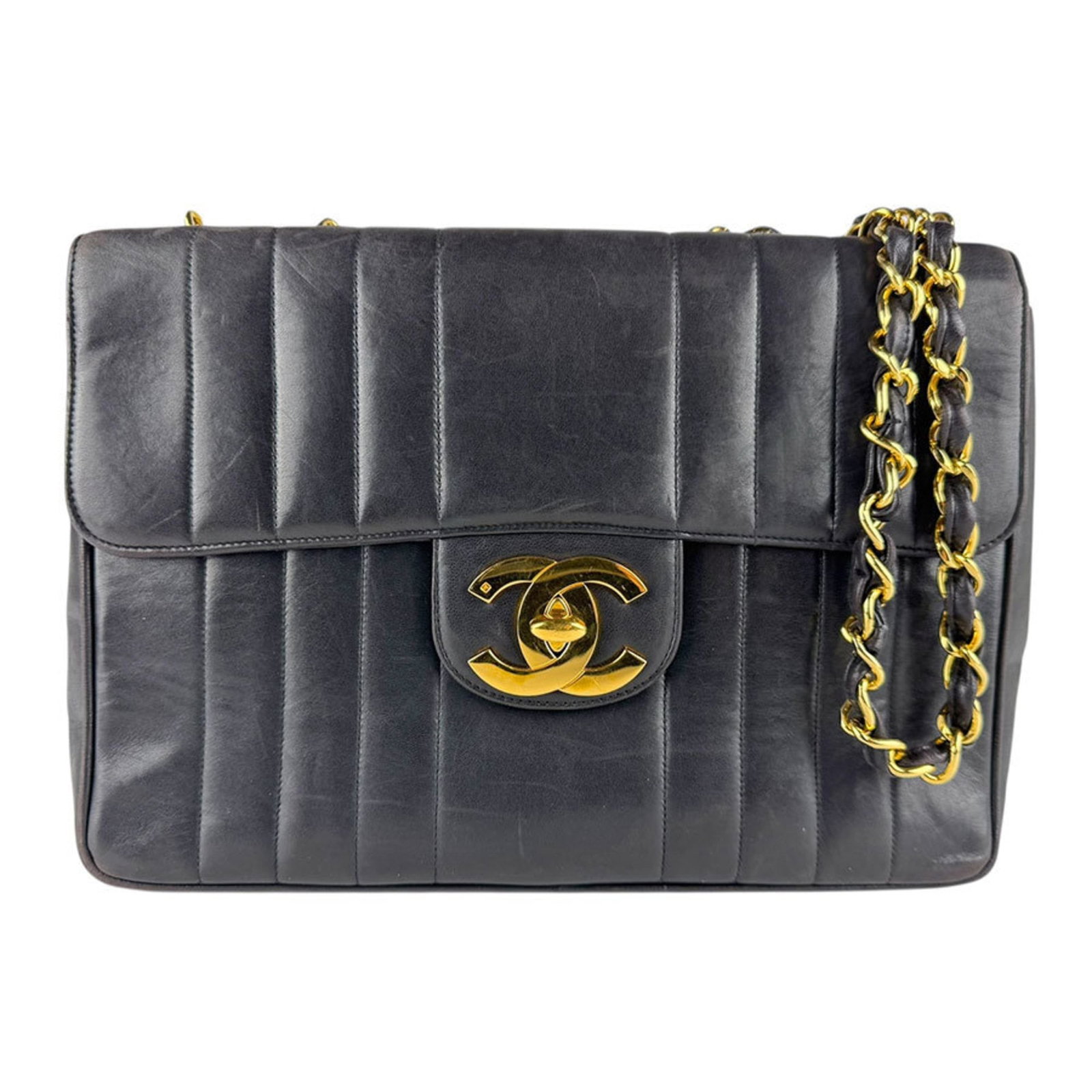 Shoulder Bag Leather Chanel: Shoulder Bag Leather Chanel This black leather shoulder bag from Chanel features classic design elements, with clean lines and a timeless silhouette. Made from high-quality leather, its durable constr