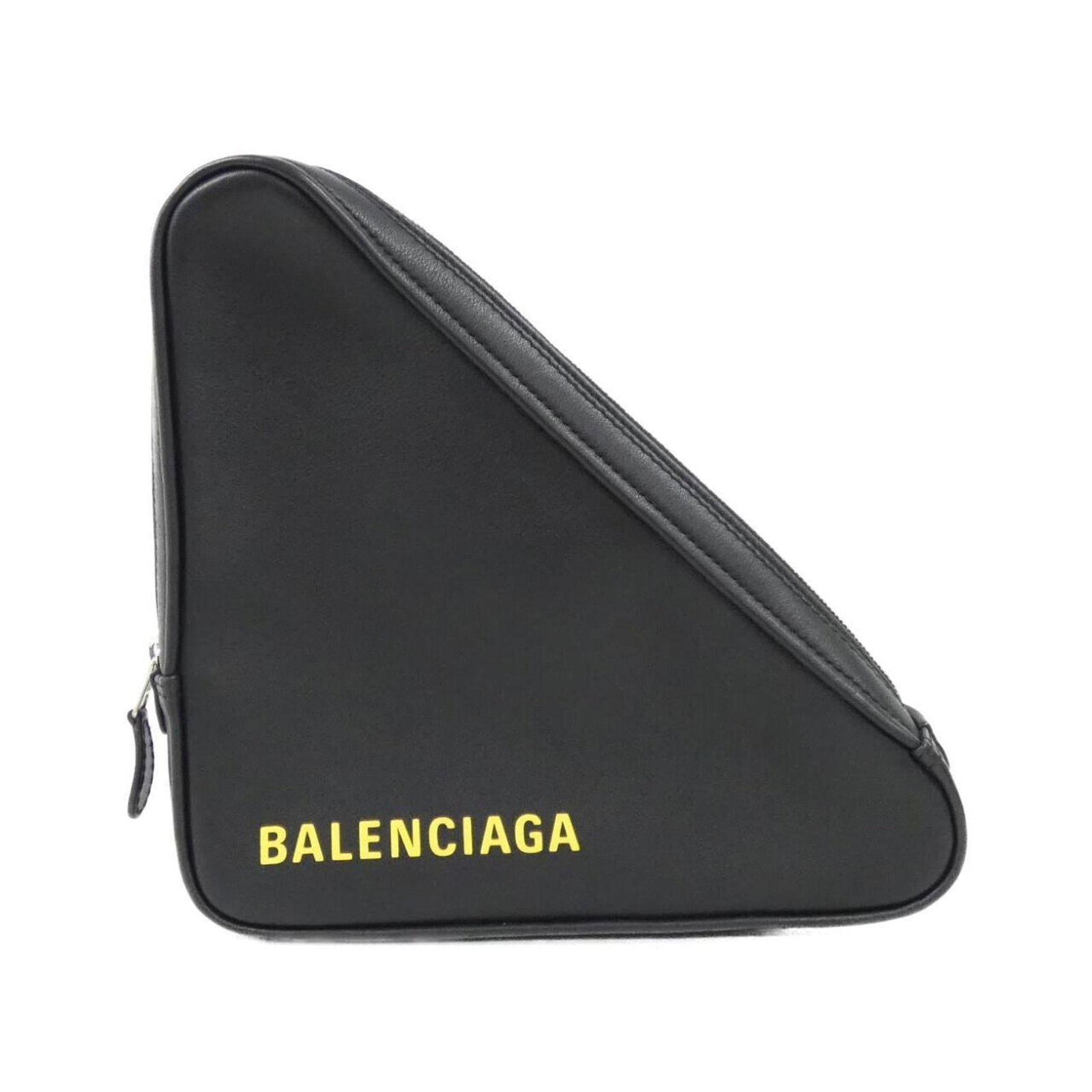 Balenciaga Handbag Pochette Leather: Balenciaga Handbag Pochette Leather Balenciaga's Pochette Leather handbag boasts sleek, modern design with its black and yellow color combination. Made from high-quality calfskin leather, the bag feat