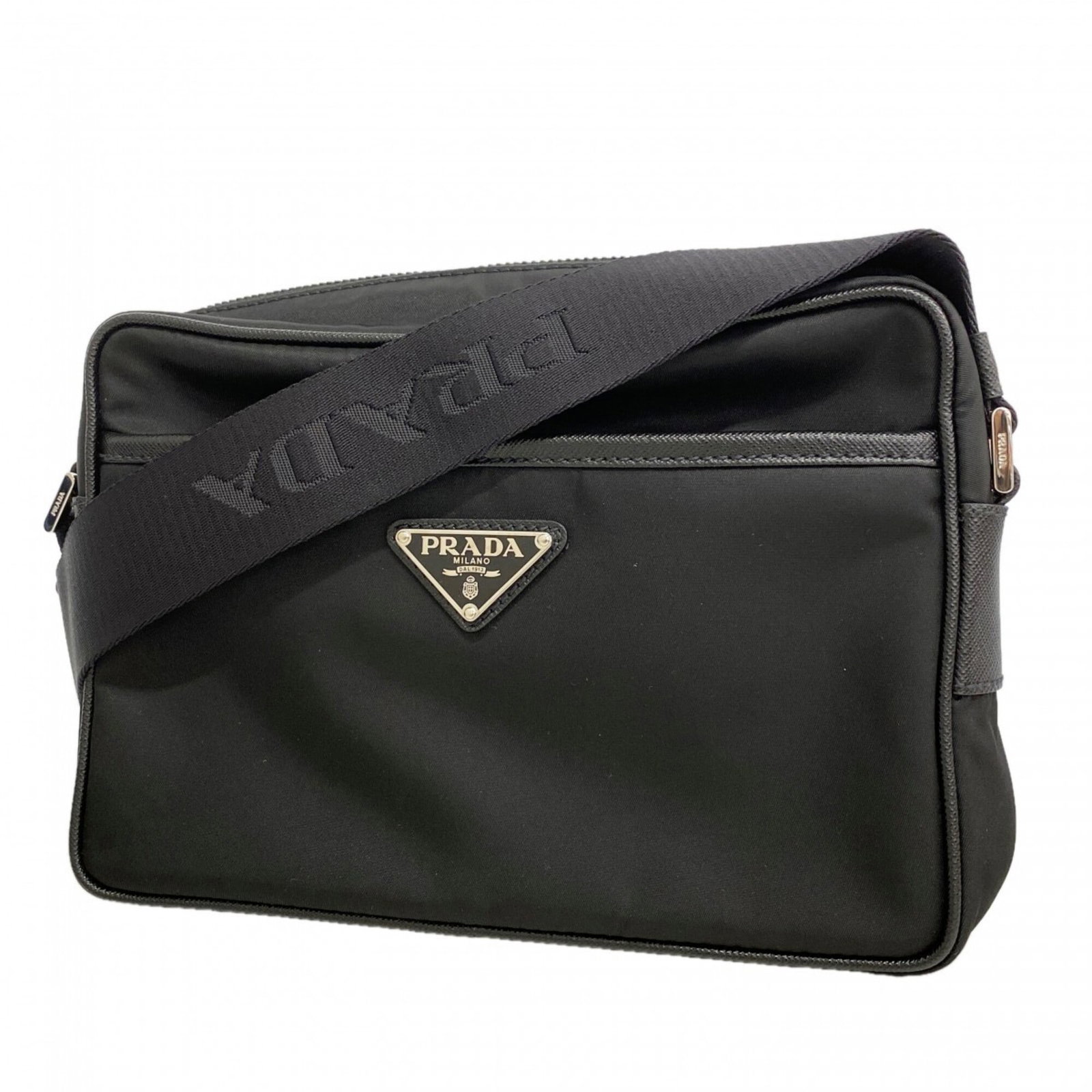 Prada Shoulder Bag Nylon: Prada Shoulder Bag Nylon The Prada Shoulder Bag Nylon boasts sleek, modern design with its black nylon material and silver hardware. Measuring just 16cm x 23cm x 7cm, it's a compact yet stylish access