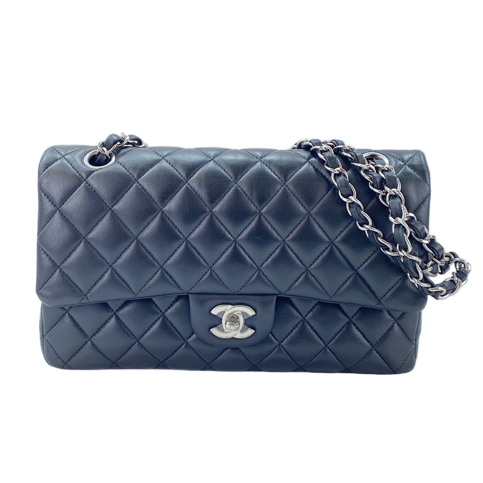 Shoulder Bag by Chanel: Shoulder Bag by Chanel Black shoulder bag by Chanel, measuring 15cm x 25cm x 6.5cm, features a sleek and sophisticated design from the renowned French fashion house. This stylish bag boasts a classic 