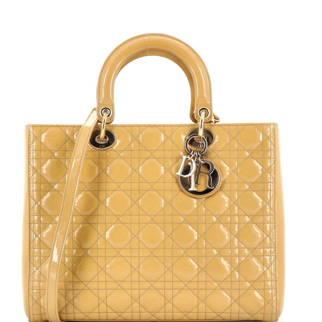 Lady Dior Cannage Large Christian Dior Patent Bag: Lady Dior Cannage Large Christian Dior Patent Bag Patent leather exterior with quilted design, featuring a large top handle and gold-tone hardware. This Christian Dior Lady Dior Cannage bag boasts a
