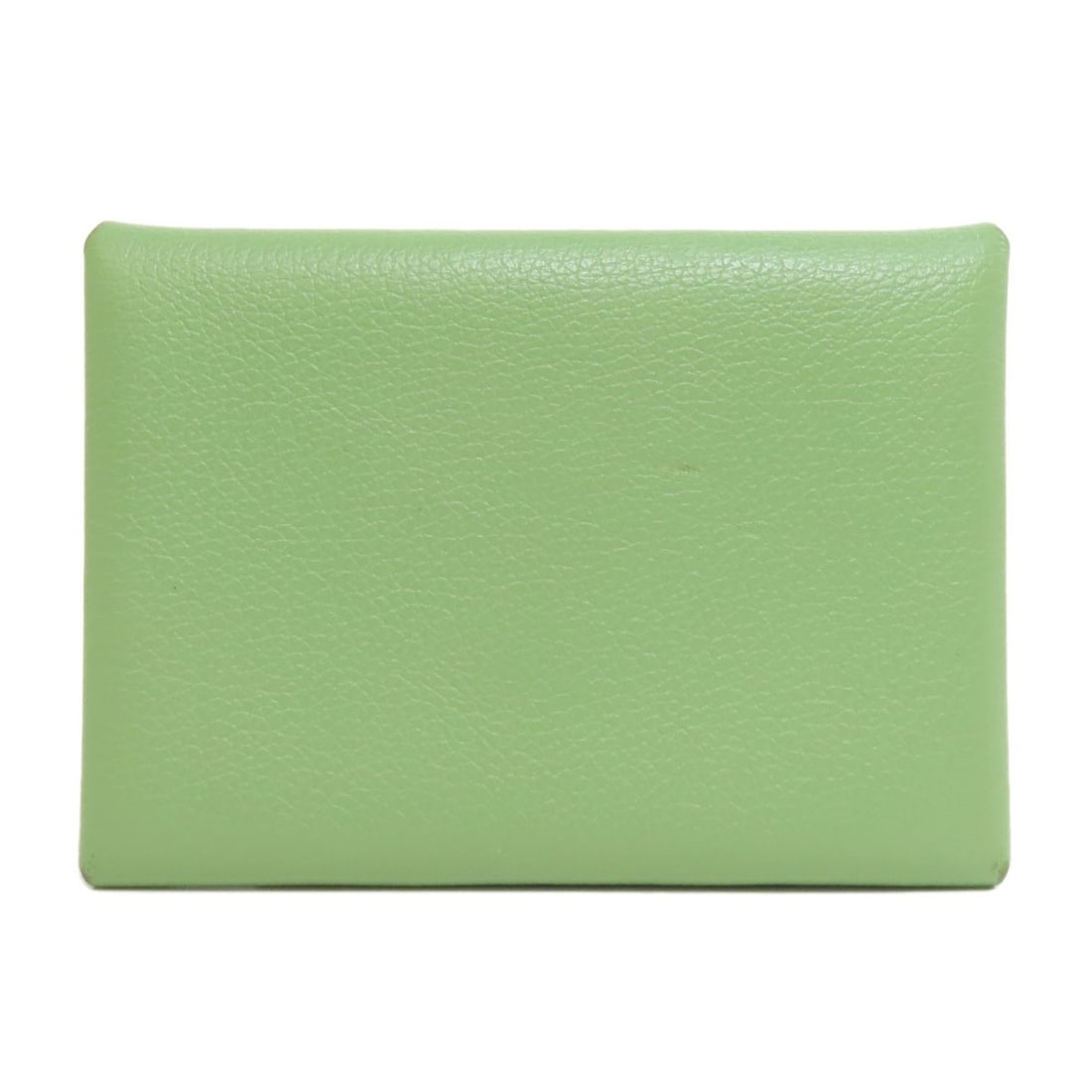 Hermes Calvi Duo Coin Purse Evercolor: Hermes Calvi Duo Coin Purse Evercolor The Hermes Calvi Duo Coin Purse Evercolor boasts a vibrant green exterior, showcasing the iconic brand's signature style. This coin purse features the distinctive