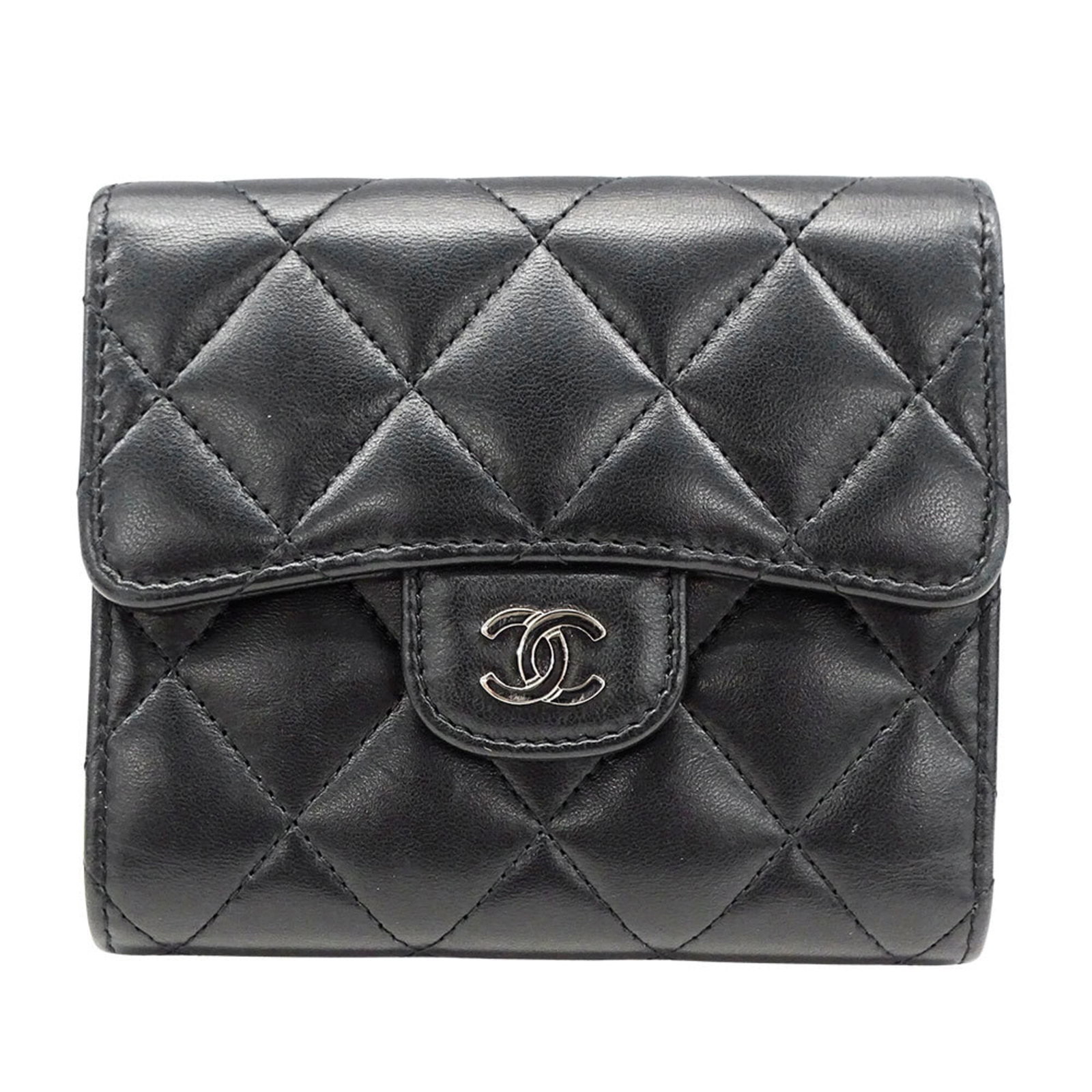 Chanel Wallet (Tri-Fold): Chanel Wallet (Tri-Fold) Black tri-fold wallet from Chanel, measuring 10cm x 11.5cm x 2cm. This sleek design features the iconic interlocking CC clasp and a compact size perfect for everyday carry. Ma