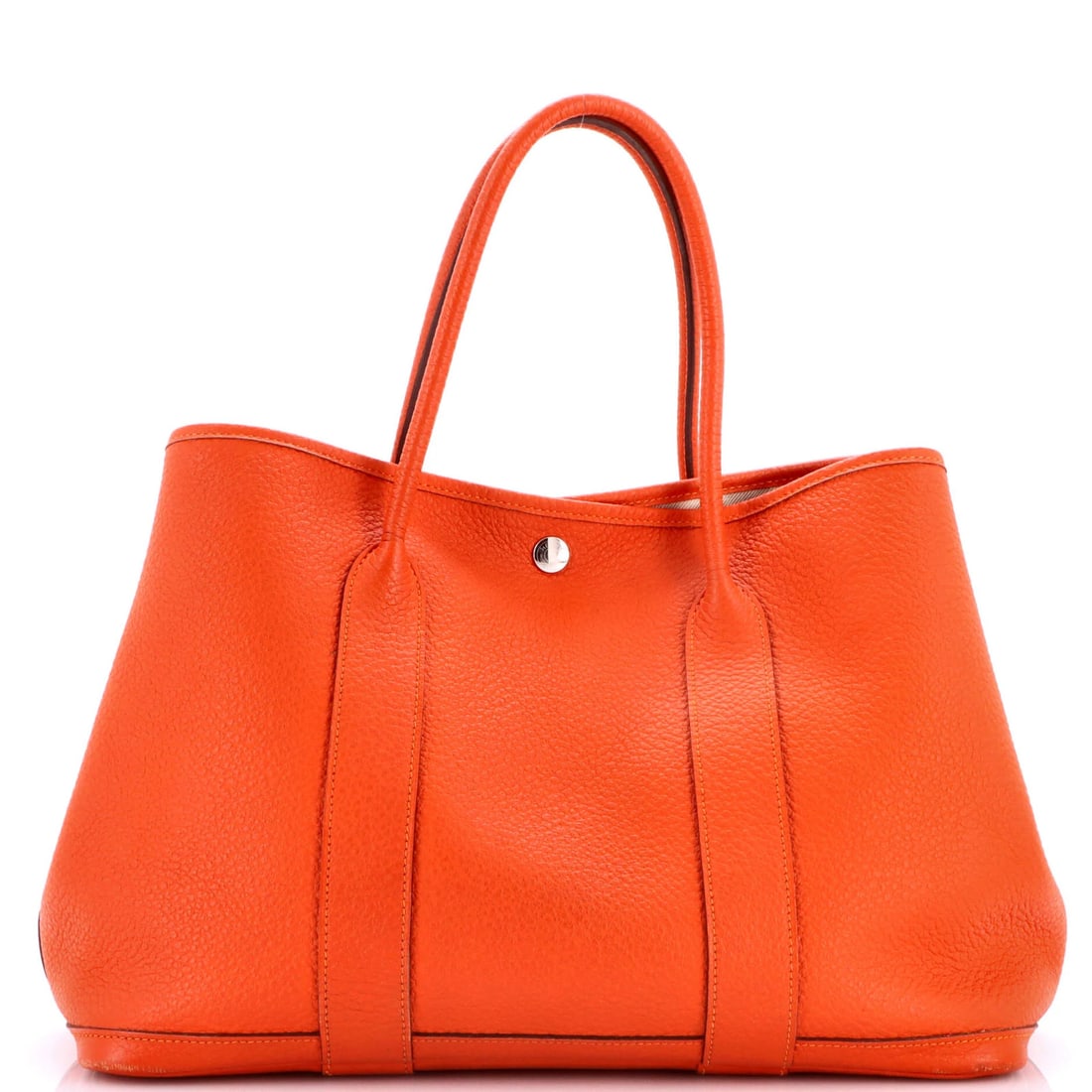 Garden Party Tote Leather 36 with Printed Hermes Interior: Garden Party Tote Leather 36 with Printed Hermes Interior Orange Garden Party Tote with Palladium Hardware, featuring a printed Hermes interior and sturdy leather exterior. This vibrant tote boasts a 