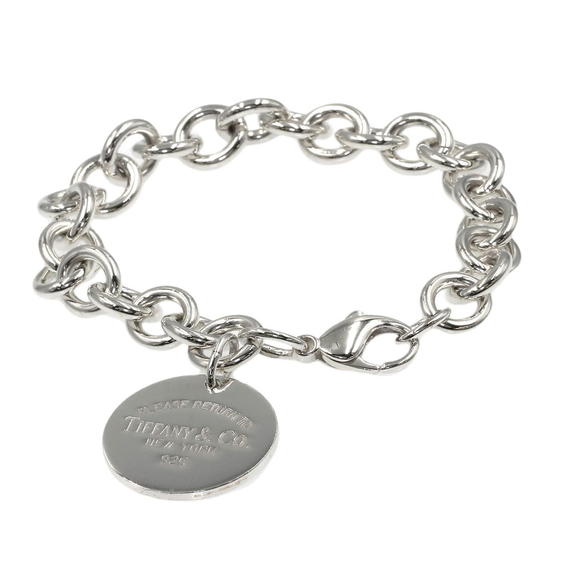 Return to Tiffany Round Silver Bracelet: Return to Tiffany Round Silver Bracelet Round silver bracelet with a sleek, modern design. Made from high-quality silver metal, this stylish accessory adds a touch of sophistication to any outfit. Ite