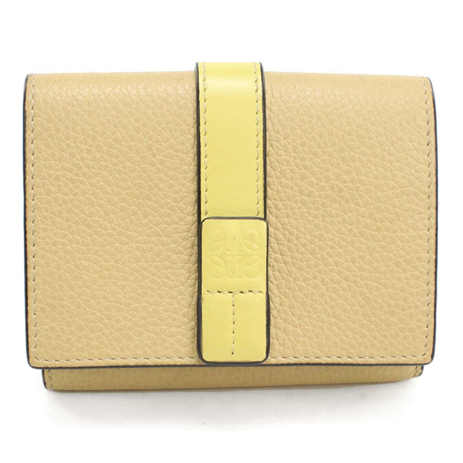 Loewe Wallet (Tri-Fold) Leather: Loewe Wallet (Tri-Fold) Leather Tri-fold leather wallet from renowned Spanish brand Loewe, crafted from high-quality calfskin. This classic design boasts clean lines and a timeless aesthetic, perfect