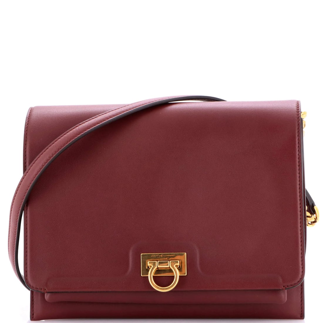Ferragamo Trifolio Flap Bag Medium Leather Salvatore: Ferragamo Trifolio Flap Bag Medium Leather Salvatore Burgundy leather Trifolio Flap Bag from Salvatore Ferragamo, featuring a medium size with 20-22" strap drop. The bag boasts a classic cross body de