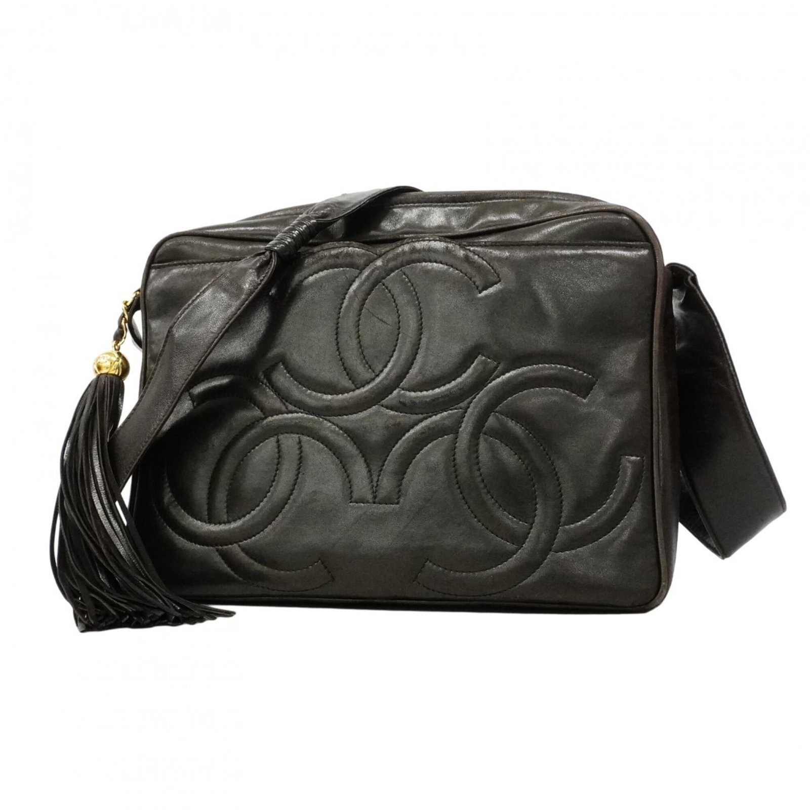 Shoulder Bag Leather Chanel: Shoulder Bag Leather Chanel This luxurious black leather shoulder bag from Chanel features striking gold hardware, showcasing the brand's signature elegance. Made from high-quality lambskin, its sleek