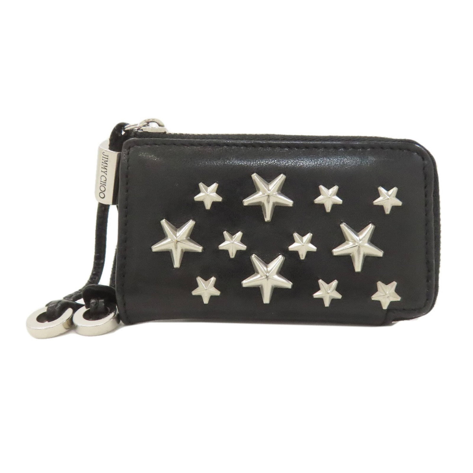 Jimmy Choo Coin Purse/ Coin Case Leather: Jimmy Choo Coin Purse/ Coin Case Leather This sleek black leather coin purse features a zipper closure and measures 6cm x 10cm x 1.5cm, making it a compact and stylish accessory for everyday use. Craf