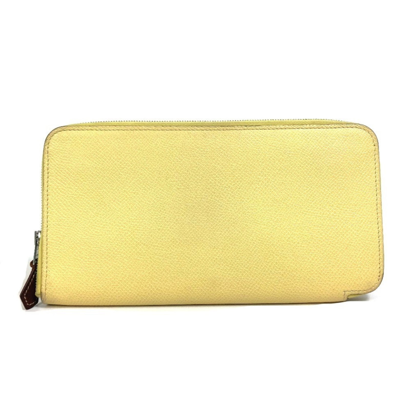 Hermes Long Wallet (Bi-Fold) Leather: Hermes Long Wallet (Bi-Fold) Leather The Hermes Long Wallet (Bi-Fold) Leather boasts sleek, modern lines and a sophisticated design. Made from high-quality leather in a striking green and yellow color