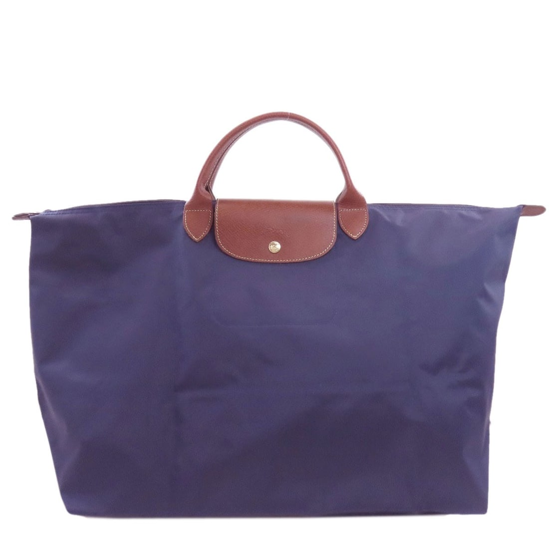 Longchamp Le Pliage Tote Bag Nylon: Longchamp Le Pliage Tote Bag Nylon Navy Longchamp Le Pliage Tote Bag made from durable Nylon. This versatile tote bag features a classic design and practical functionality, perfect for everyday use. I