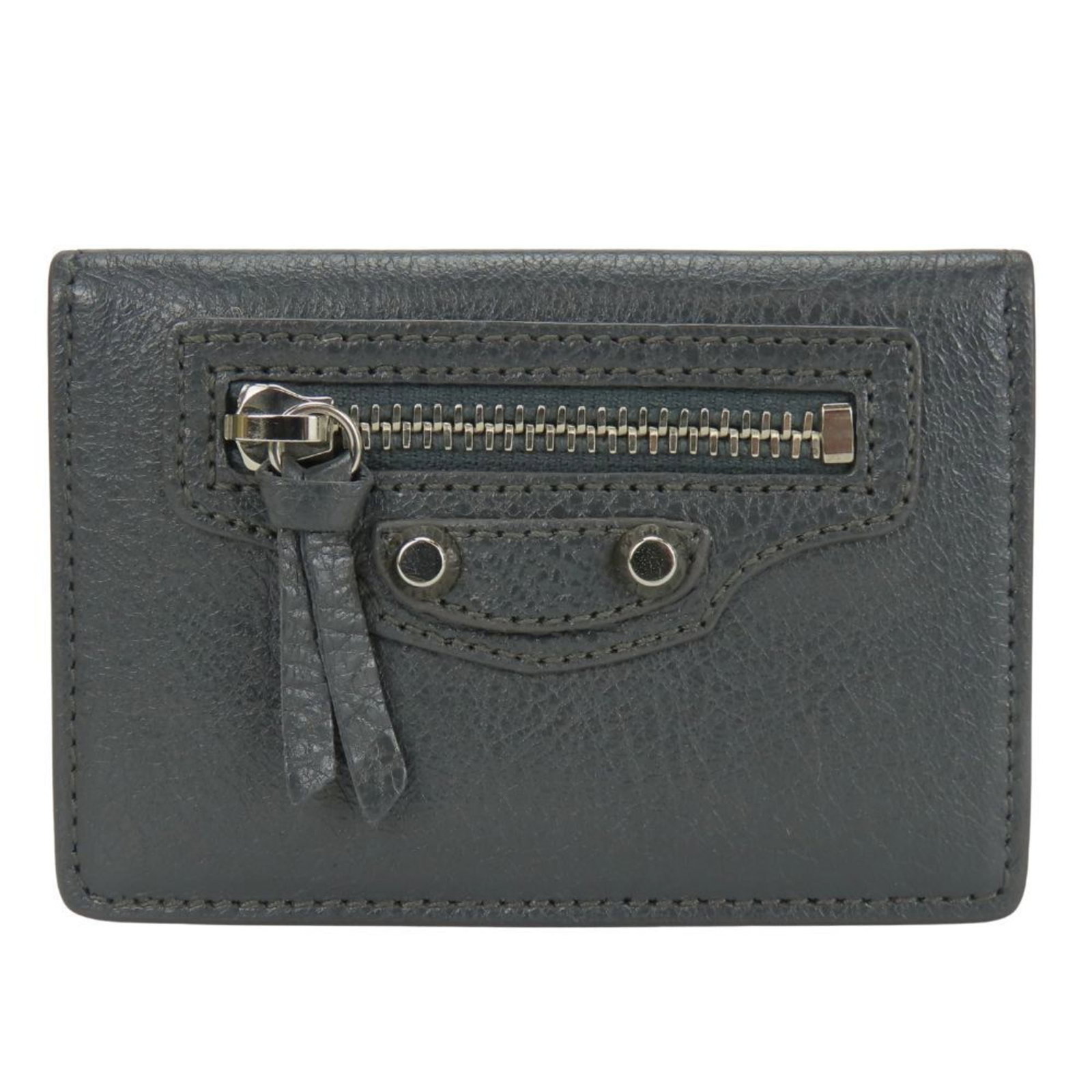Balenciaga Wallet (Tri-Fold) Leather: Balenciaga Wallet (Tri-Fold) Leather Tri-fold wallet from Balenciaga, crafted in gray leather with a sleek and modern design. This compact wallet measures 6.5cm x 9.5cm x 2cm, making it perfect for ev