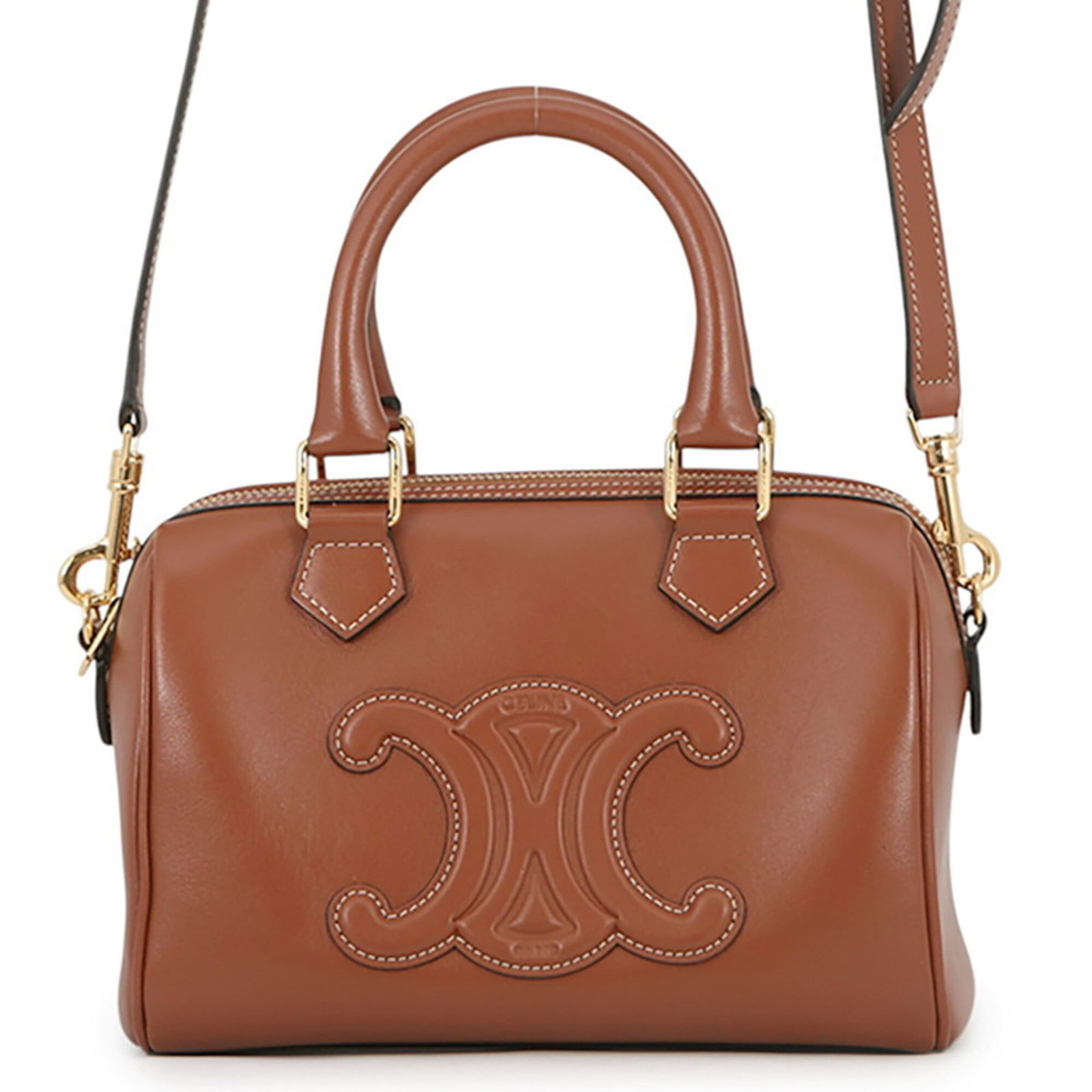 Handbag Leather Celine: Handbag Leather Celine Camel-colored leather handbag from Celine, Italy, with dimensions 14cm x 20.5cm x 11cm. This stylish bag features high-quality materials and a classic design. The item bears a s