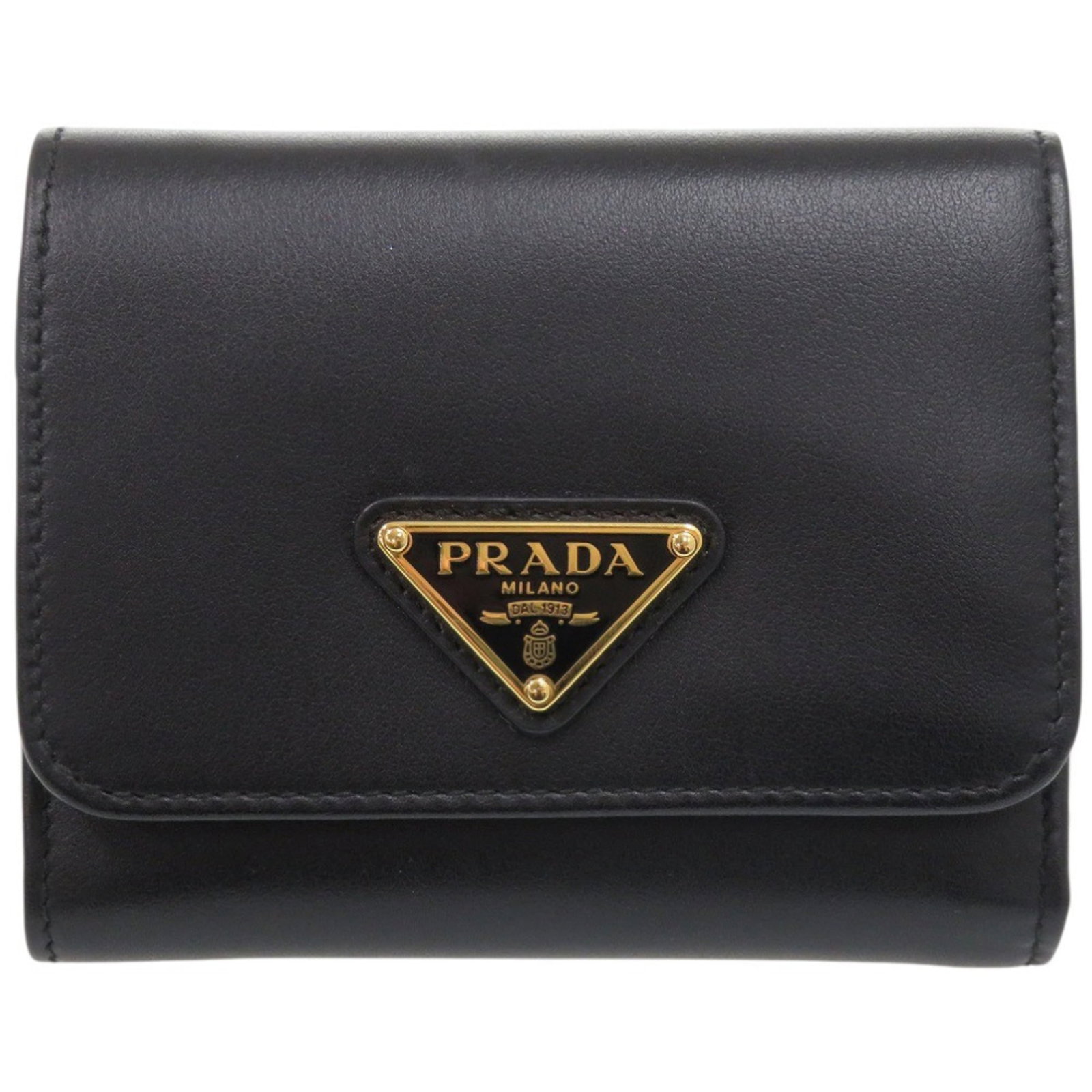 Prada Wallet (Tri-Fold) Saffiano Triangle: Prada Wallet (Tri-Fold) Saffiano Triangle Prada's Saffiano triangle wallet offers sleek sophistication with its tri-fold design and durable Saffiano material. The black finish provides a timeless look