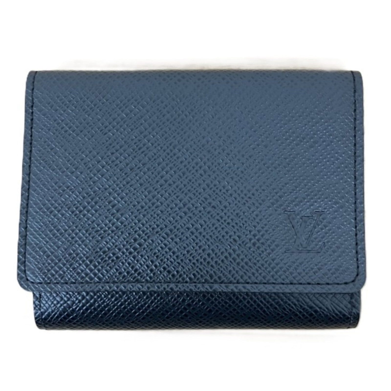 Louis Vuitton Coin Purse/ Coin Case Leather: Louis Vuitton Coin Purse/ Coin Case Leather The Louis Vuitton Coin Purse/ Coin Case Leather is a sleek and sophisticated accessory, featuring the iconic monogram pattern in black leather. Measuring 8.