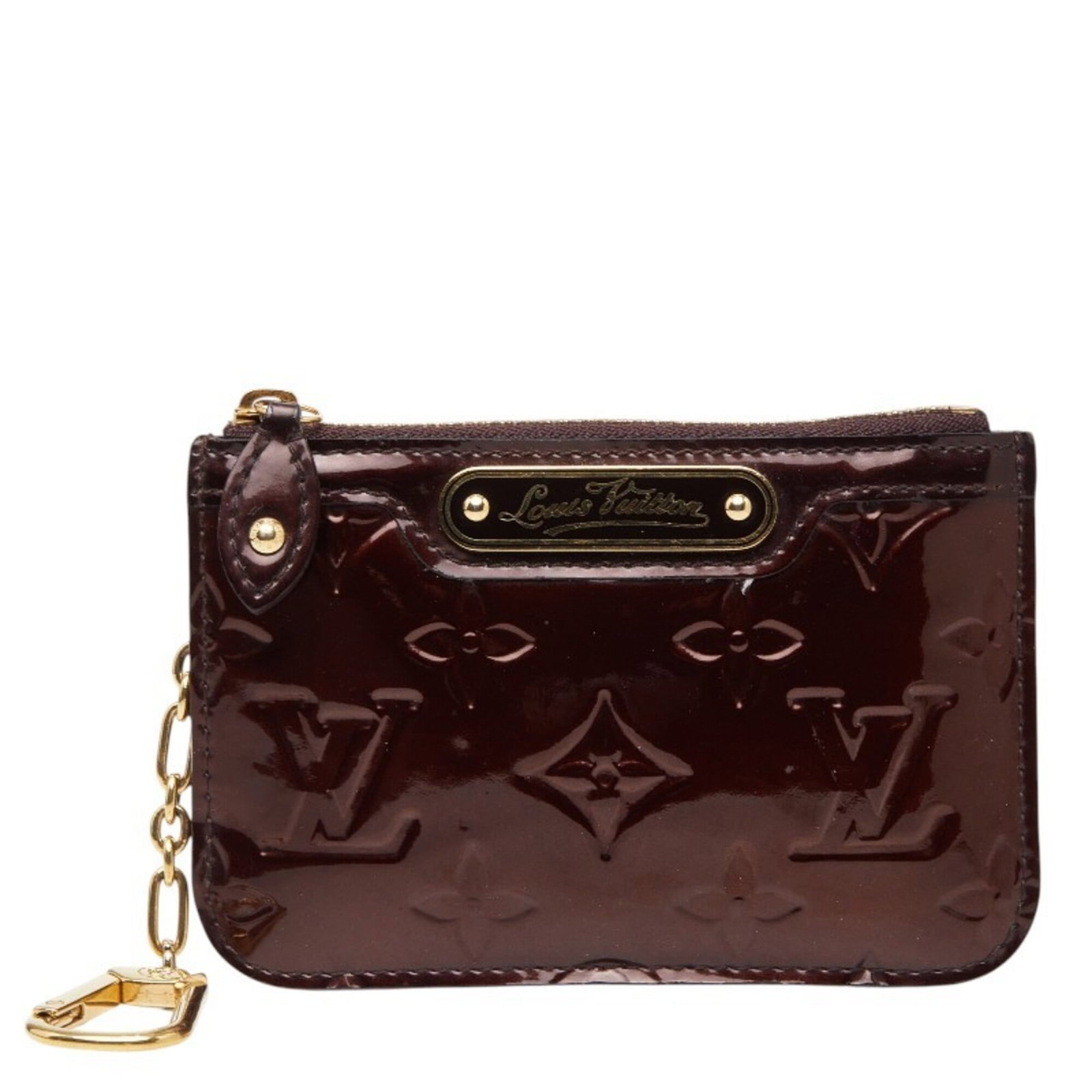 Patent Leather Louis Vuitton Coin Case: Patent Leather Louis Vuitton Coin Case Amarante patent leather coin case from Louis Vuitton features a rich, purple hue and sleek design. Made from high-quality patent leather, this compact case measu