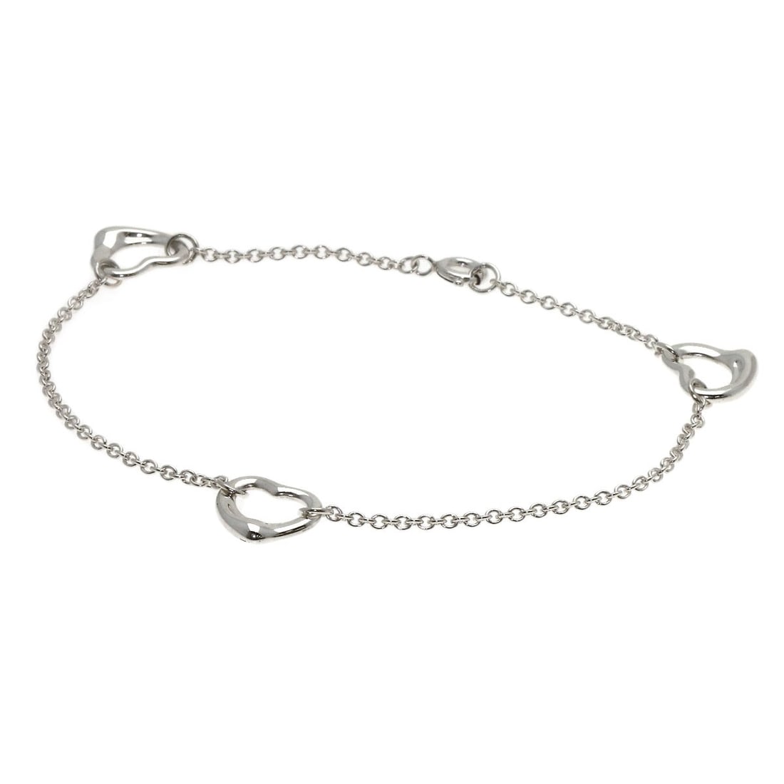 Open Heart 3P Silver Bracelet Tiffany&Co: Open Heart 3P Silver Bracelet Tiffany&Co Silver Tiffany&Co. Open Heart 3P Bracelet - A sleek and modern design, this open heart bracelet features the iconic Tiffany&Co. style with a silver finish.