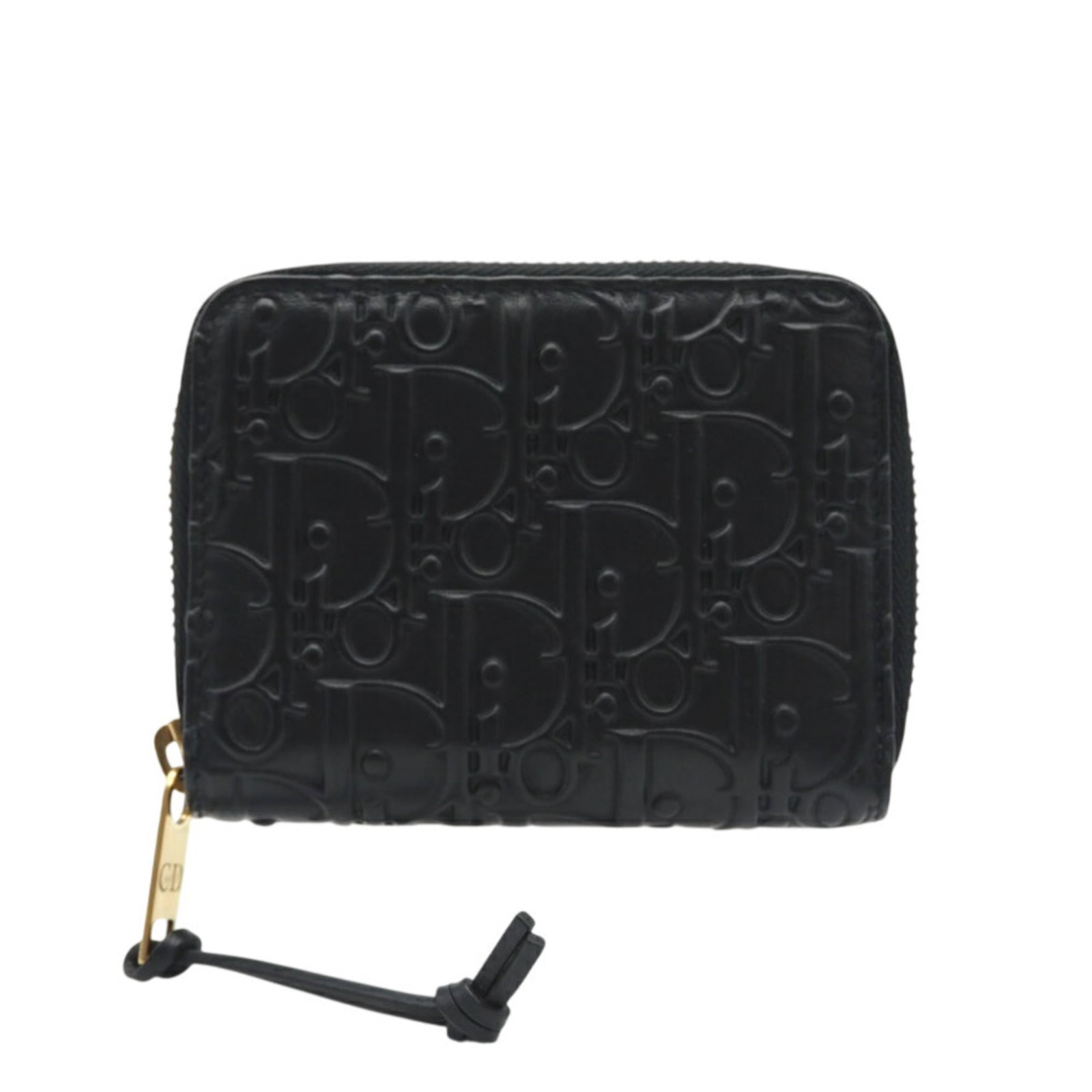 Christian Dior Coin Purse/ Coin Case Leather: Christian Dior Coin Purse/ Coin Case Leather This sleek black leather coin purse from Christian Dior features a classic design with clean lines and a sophisticated look. Made from high-quality Italian