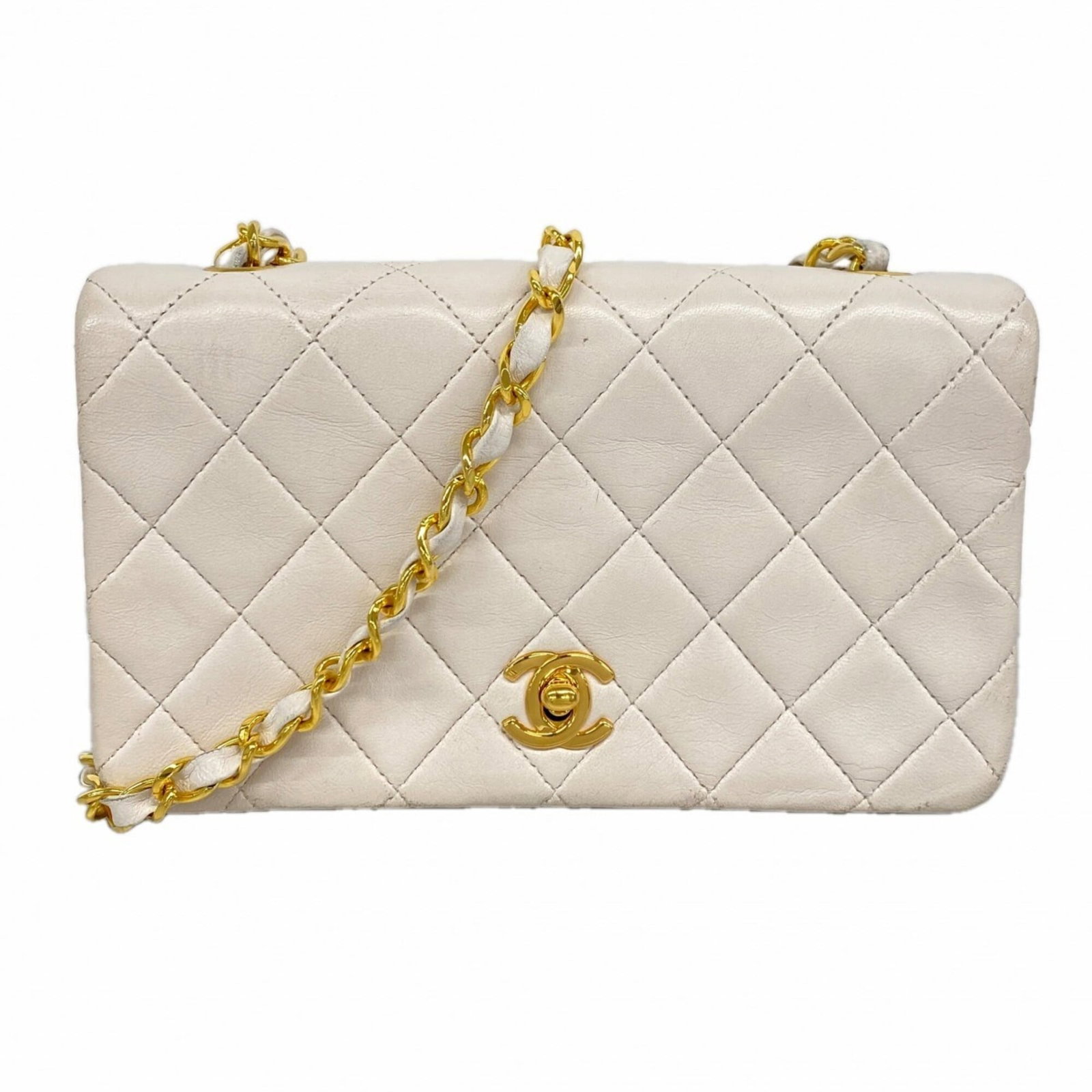 Shoulder Bag Leather Chanel: Shoulder Bag Leather Chanel This luxurious Chanel shoulder bag is crafted from high-quality lambskin leather, featuring a crisp white finish and elegant gold hardware. Measuring 11cm x 19cm x 7cm, it 