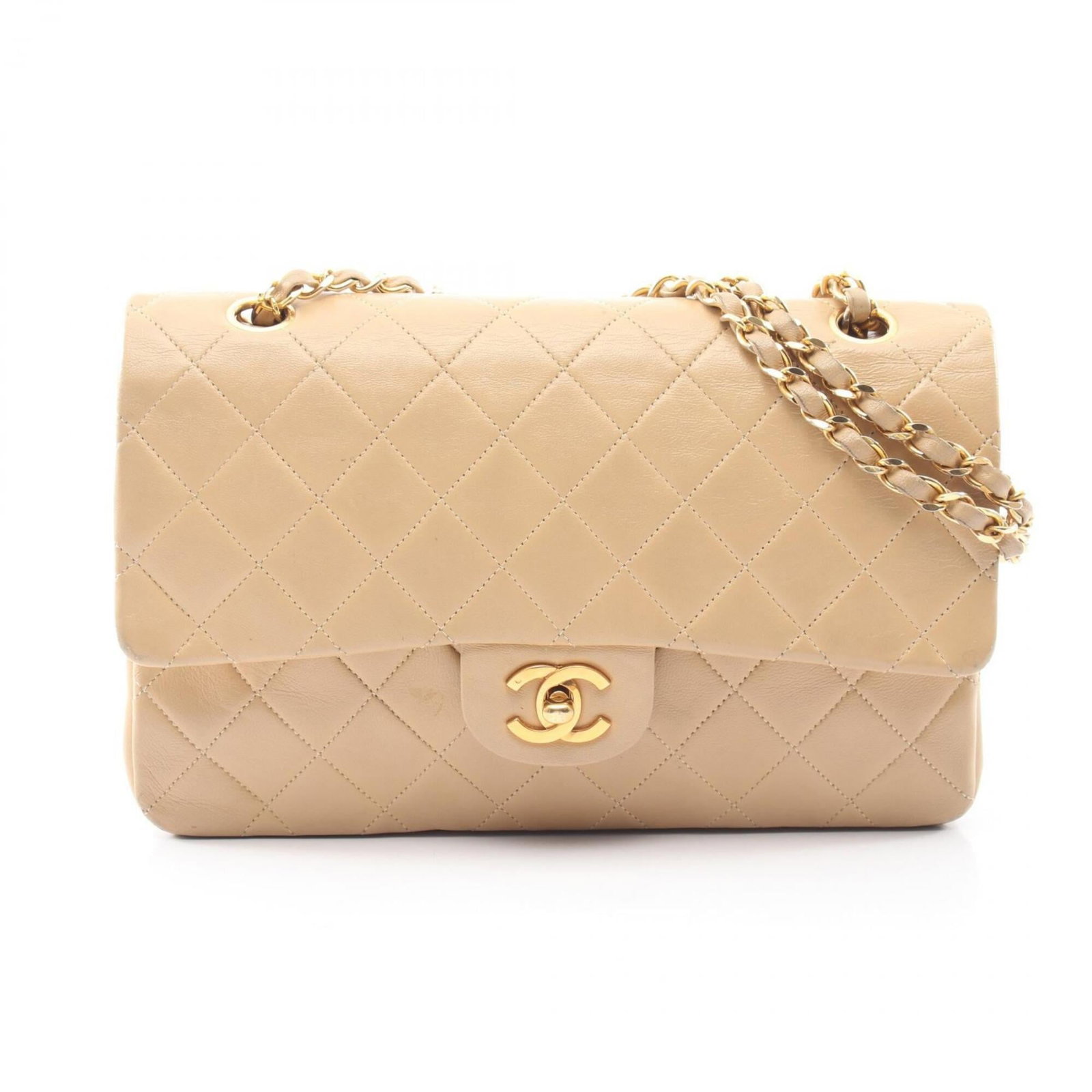 Chanel Handbag Shoulder Bag Leather: Chanel Handbag Shoulder Bag Leather This exquisite Chanel Handbag Shoulder Bag features luxurious lambskin leather in a timeless beige color. Measuring 16cm x 25cm x 6.5cm, it boasts a classic design 
