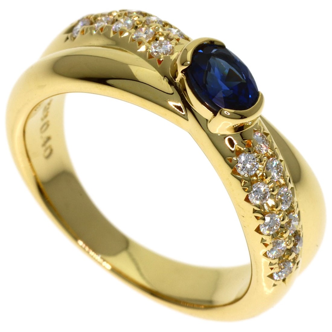 Sapphire Diamond K18 Yellow Gold Ring Tasaki: Sapphire Diamond K18 Yellow Gold Ring Tasaki K18 Yellow Gold Ring Tasaki boasts a striking combination of sapphire and diamond accents, set against a rich gold background. The ring's K18 purity ensure