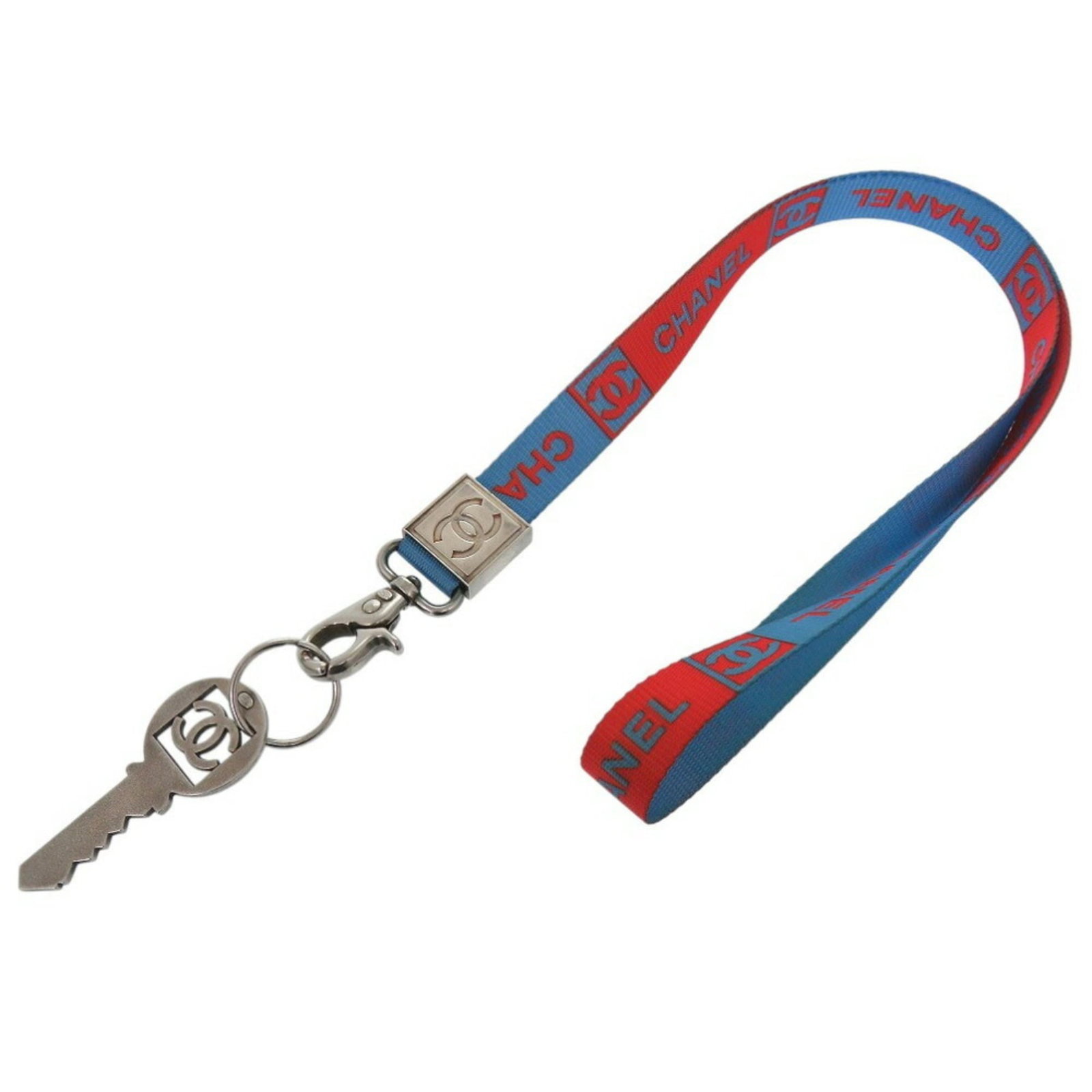 Nylon strap for neck by Chanel: Nylon strap for neck by Chanel Nylon strap for neck by Chanel, featuring a multi-color and silver design. Made from high-quality nylon material, this accessory showcases a unique blend of colors and m