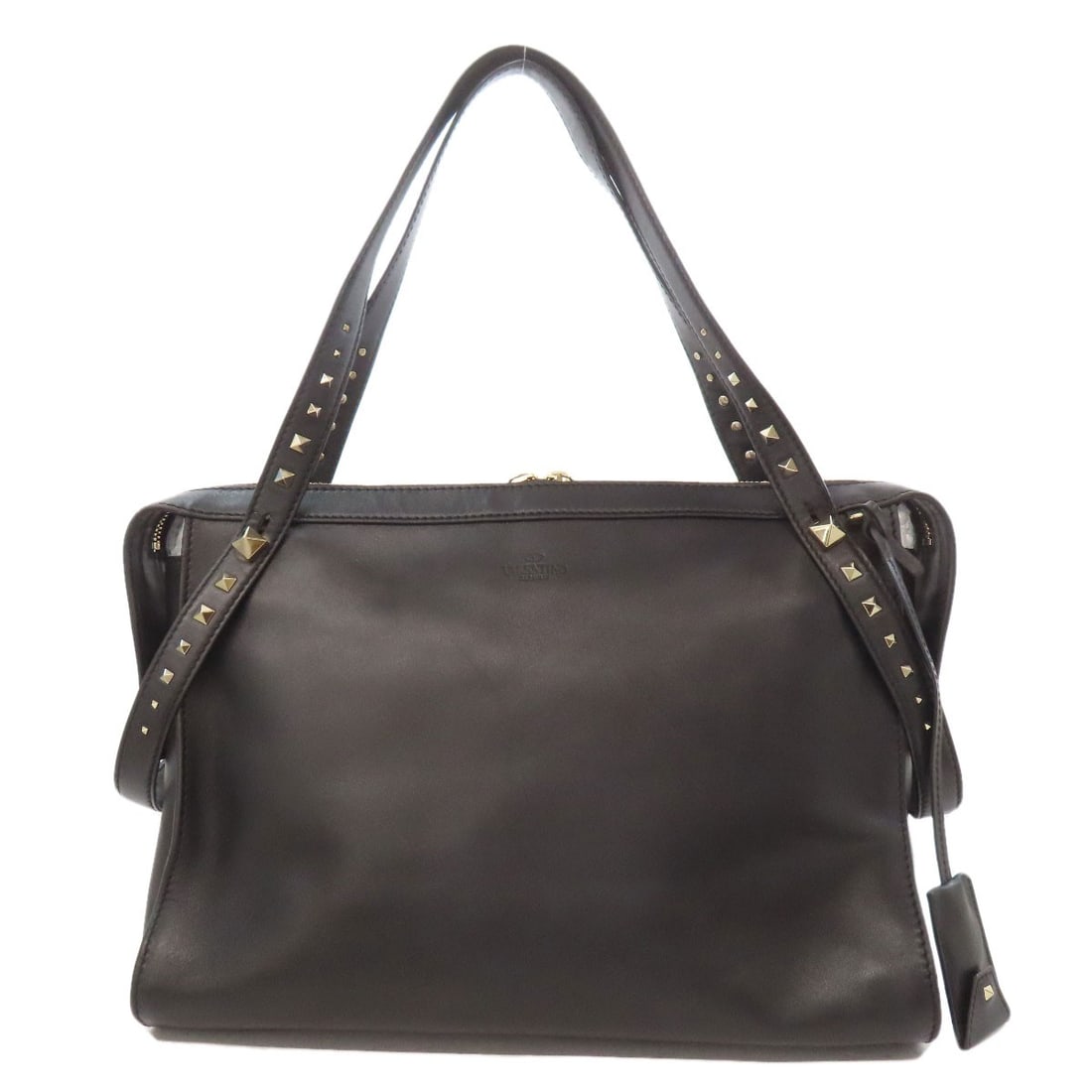 Valentino Studs Shoulder Bag Leather: Valentino Studs Shoulder Bag Leather Black leather shoulder bag with Valentino studs, a stylish and sophisticated accessory. The bag's sleek design and luxurious material make it a versatile addition 