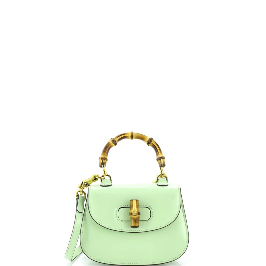 Bamboo leather bag 1947 top mini handle Gucci: Bamboo leather bag 1947 top mini handle Gucci Bamboo leather bag with iconic Gucci 1947 top handle design, boasting a striking green exterior and neutral interior. Measuring just 4.5" in height, this 