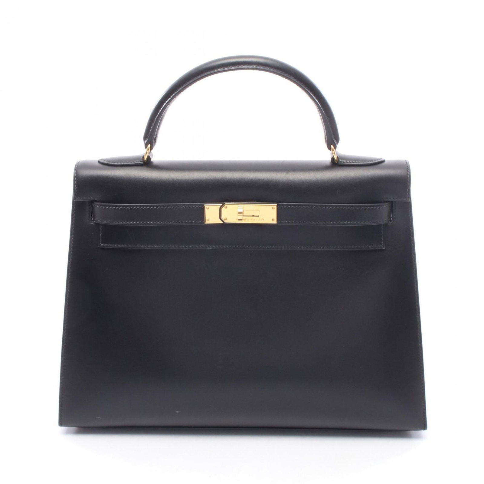 Calf Leather Handbag Hermes Box: Calf Leather Handbag Hermes Box Box calf leather construction provides durability and a luxurious feel. The sleek black design features a classic shape, making it a timeless accessory for everyday