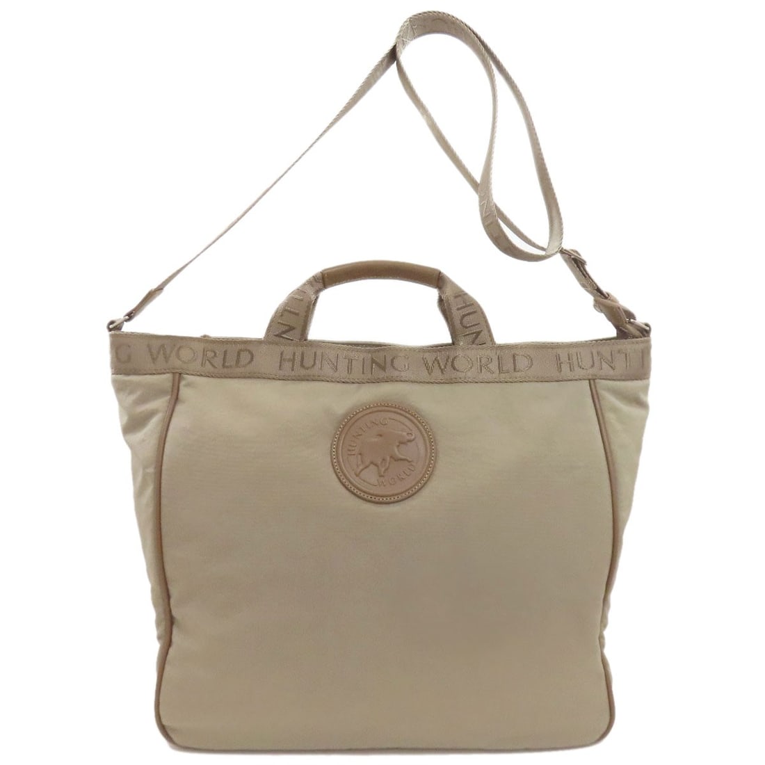 Hunting World 2Way Handbag Nylon: Hunting World 2Way Handbag Nylon The Hunting World 2Way Handbag Nylon boasts a sleek gray exterior made from durable nylon, perfect for everyday use. This versatile handbag features a straightforward 