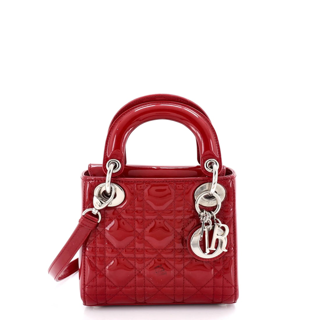 Christian Dior Lady Dior Bag Cannage Quilt Patent Mini: Christian Dior Lady Dior Bag Cannage Quilt Patent Mini The Christian Dior Lady Dior Bag Cannage Quilt Patent Mini is a striking mini handbag with patent leather exterior in bold red. Featuring top han