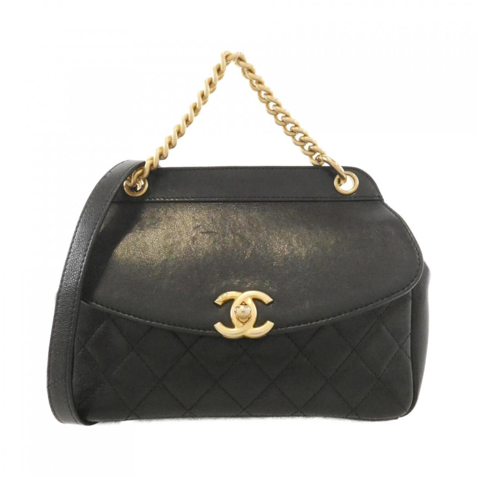 Chanel Handbag leather: Chanel Handbag leather Black and Brown Leather Calfskin and Lamb Handbag. This Chanel handbag features high-quality leather made from calfskin and lamb, with a classic design that exudes timeless eleg