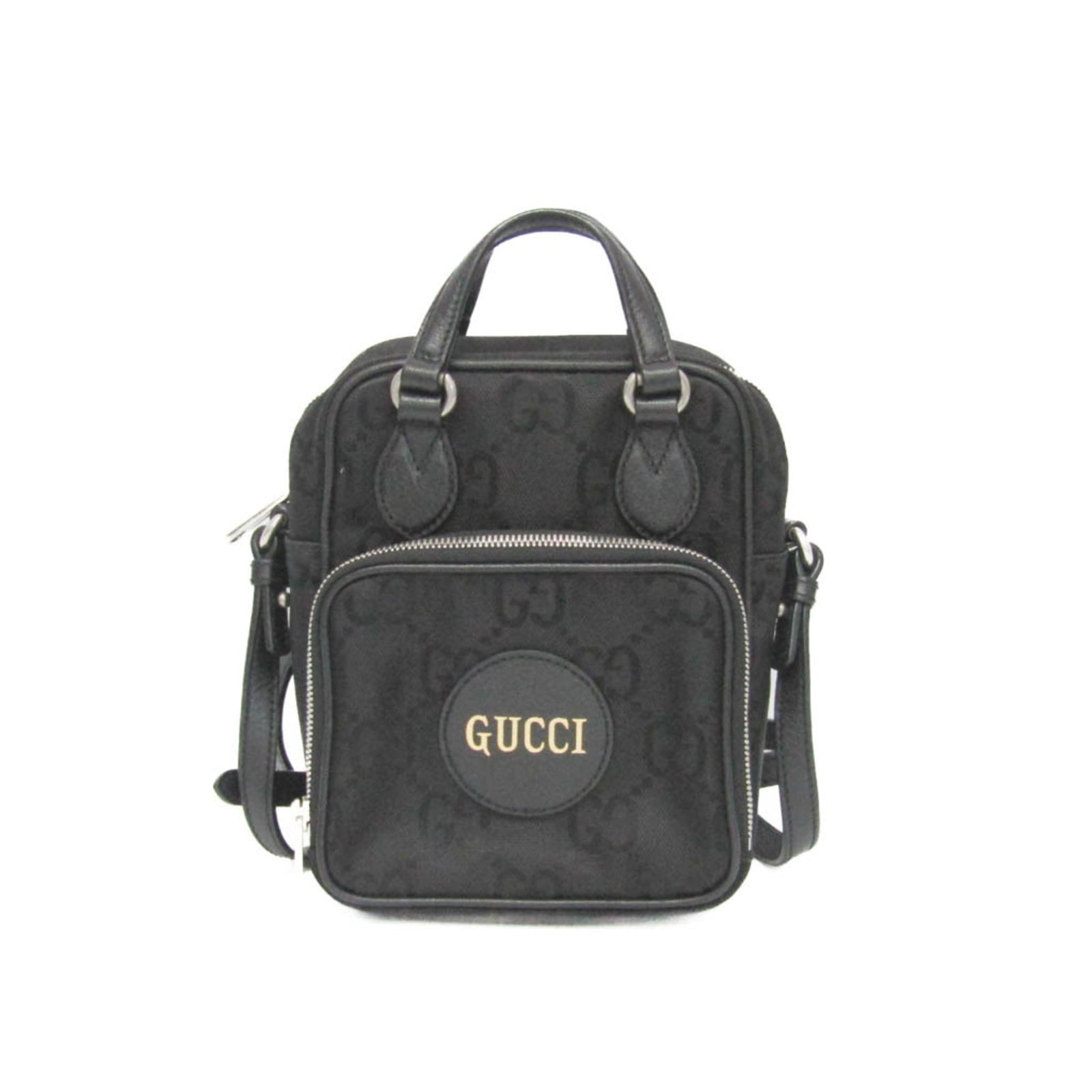 Nylon leather bag from Gucci: Nylon leather bag from Gucci Nylon leather bag from Gucci, featuring an open pocket and zipper pocket for organization. Made with nylon and leather materials, this GG Nylon Off the Grid shoulder bag b