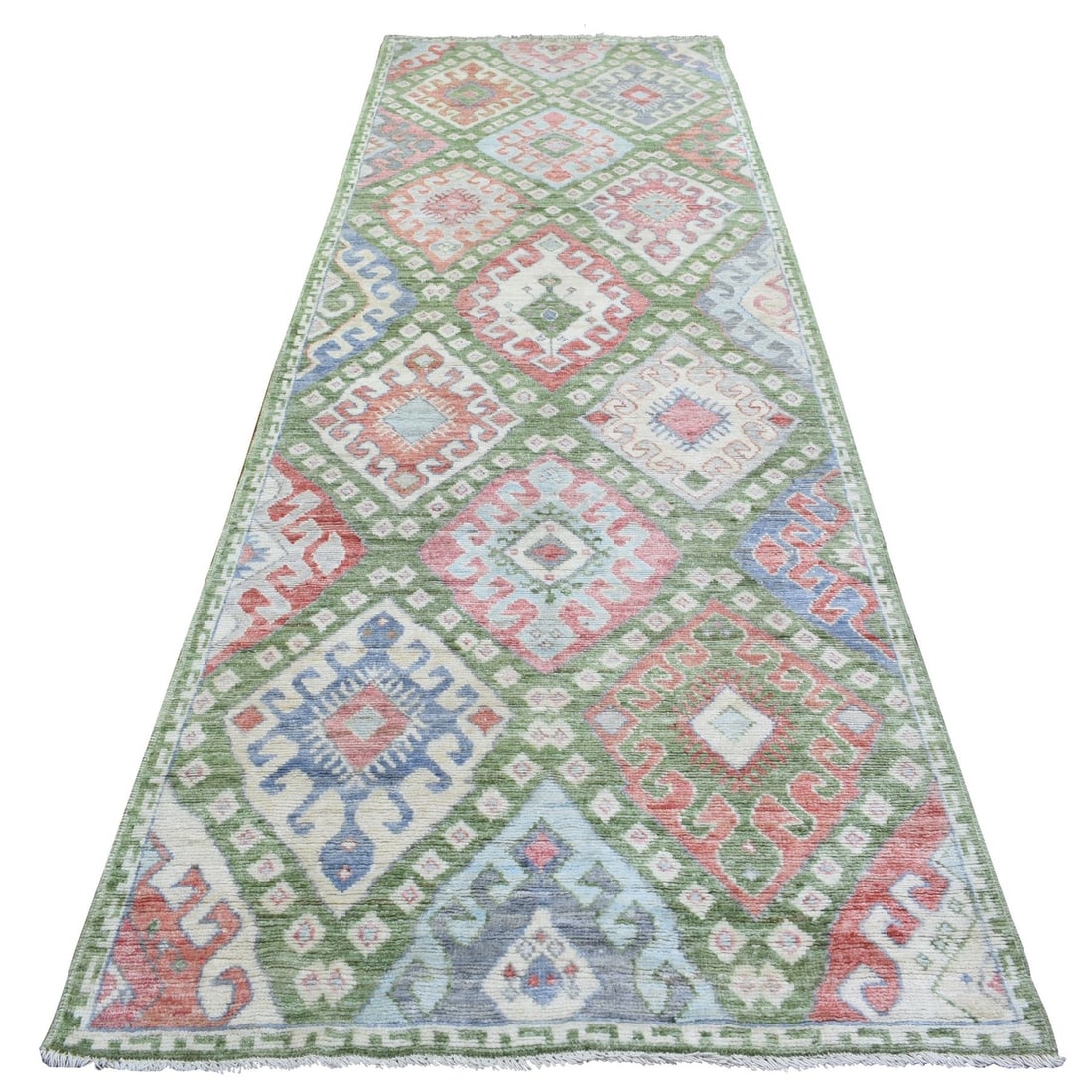 3'10"x12' Colorful Inspired Large Elements Hand Knotted Wool Runner Rug: 3'10"x12' Colorful Inspired Large Elements Hand Knotted Wool Runner Rug The vibrant, multicolored field of the hand-knotted wool runner rug creates a stunning visual effect, inspired by Anatolian styl