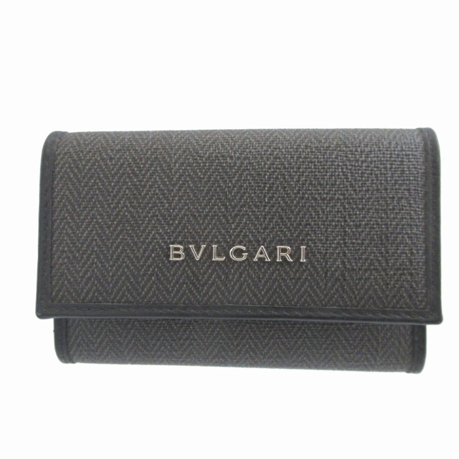 Excellent Condition Bulgari Weekend Coated Canvas Key Case In Gray And Black 6-Ring Accessory: Excellent Condition Bulgari Weekend Coated Canvas Key Case In Gray And Black 6-Ring Accessory Coated canvas construction provides durability and style. This Bvlgari Weekend key case features a sleek g