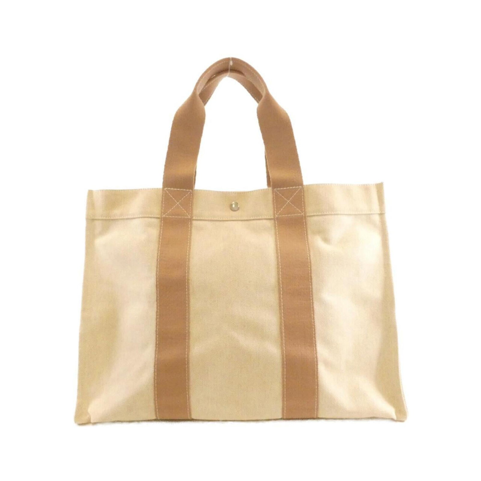 Handbag Canvas by Hermes: Handbag Canvas by Hermes Canvas by Hermes, a timeless and versatile handbag in beige canvas with silver hardware, measuring 37cm x 48cm x 24cm. This classic design showcases the iconic style of the Fr