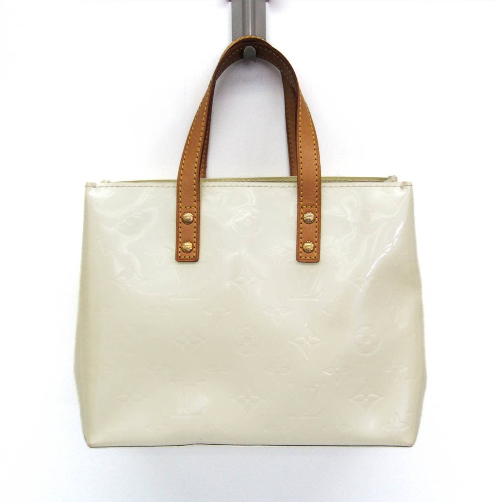 Louis Vuitton Vernis Monogram Handbag: Louis Vuitton Vernis Monogram Handbag The Louis Vuitton Vernis Monogram Handbag boasts its iconic Pearl monogram pattern in rich, luxurious colors. With gold hardware and a sturdy zipper pocket, this 