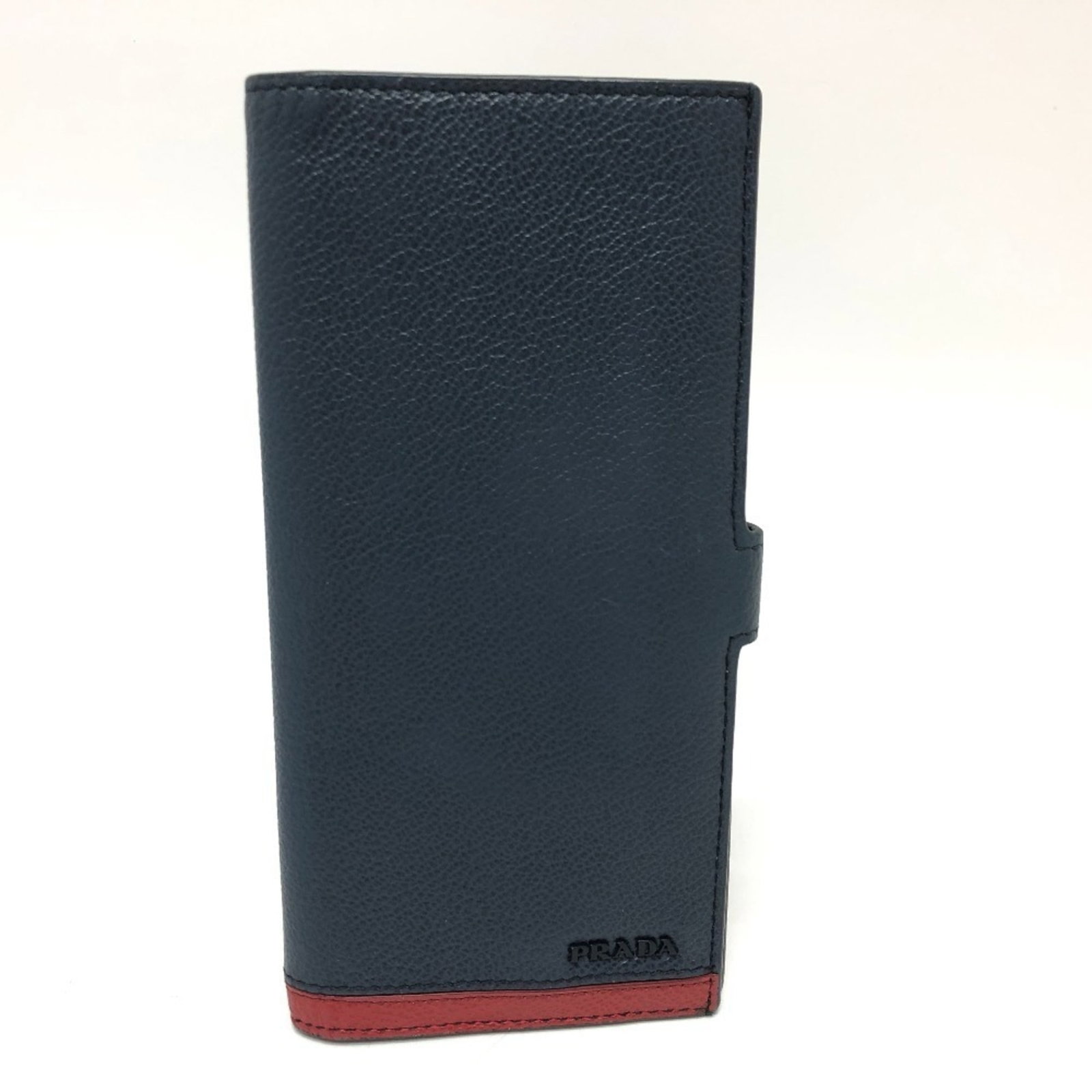 Long Wallet Leather Bi Fold Prada: Long Wallet Leather Bi Fold Prada Blue long wallet with bi-fold design made from high-quality leather, measuring 19cm x 9cm. This stylish accessory features a classic Prada style that adds a touch of 
