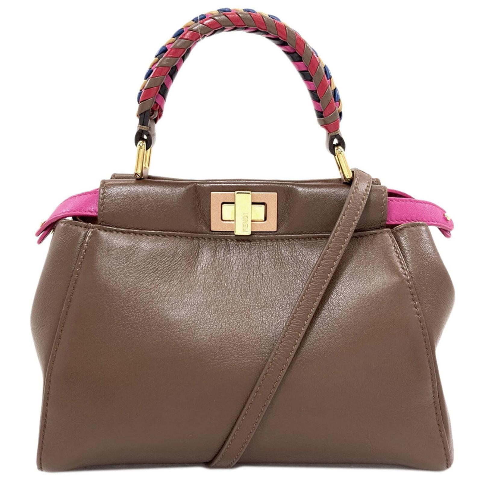 Handbag Leather Fendi: Handbag Leather Fendi Brown and Pink Fendi Handbag. Made from high-quality leather, this handbag measures 18cm x 23cm x 11.5cm and features a unique color combination of brown and pink. The bag's clas