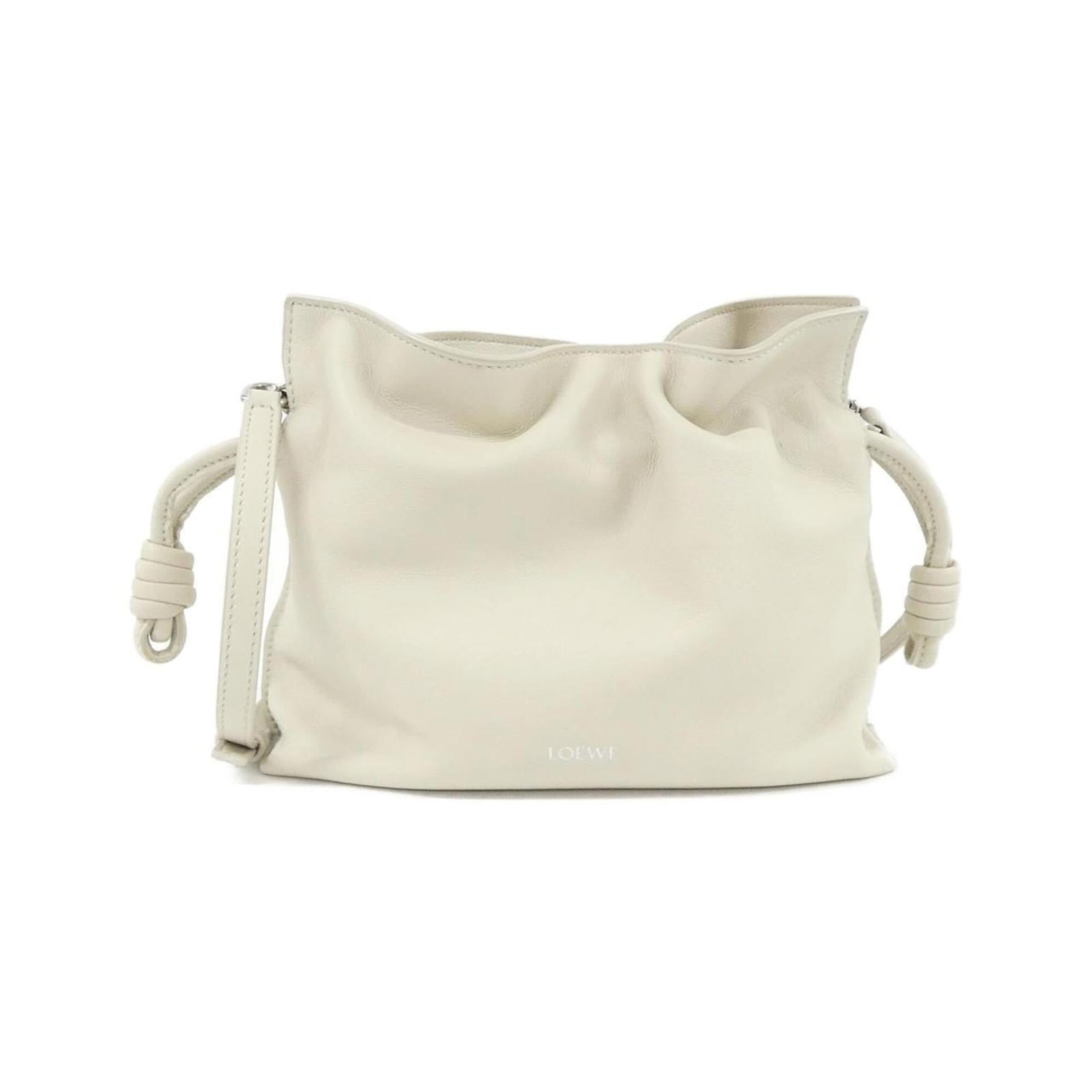 Loewe Beach Bag Handbag Leather: Loewe Beach Bag Handbag Leather Loewe Beach Bag Handbag Leather features a timeless design with a classic ivory and white color combination, crafted from high-quality calfskin leather. The bag's compa