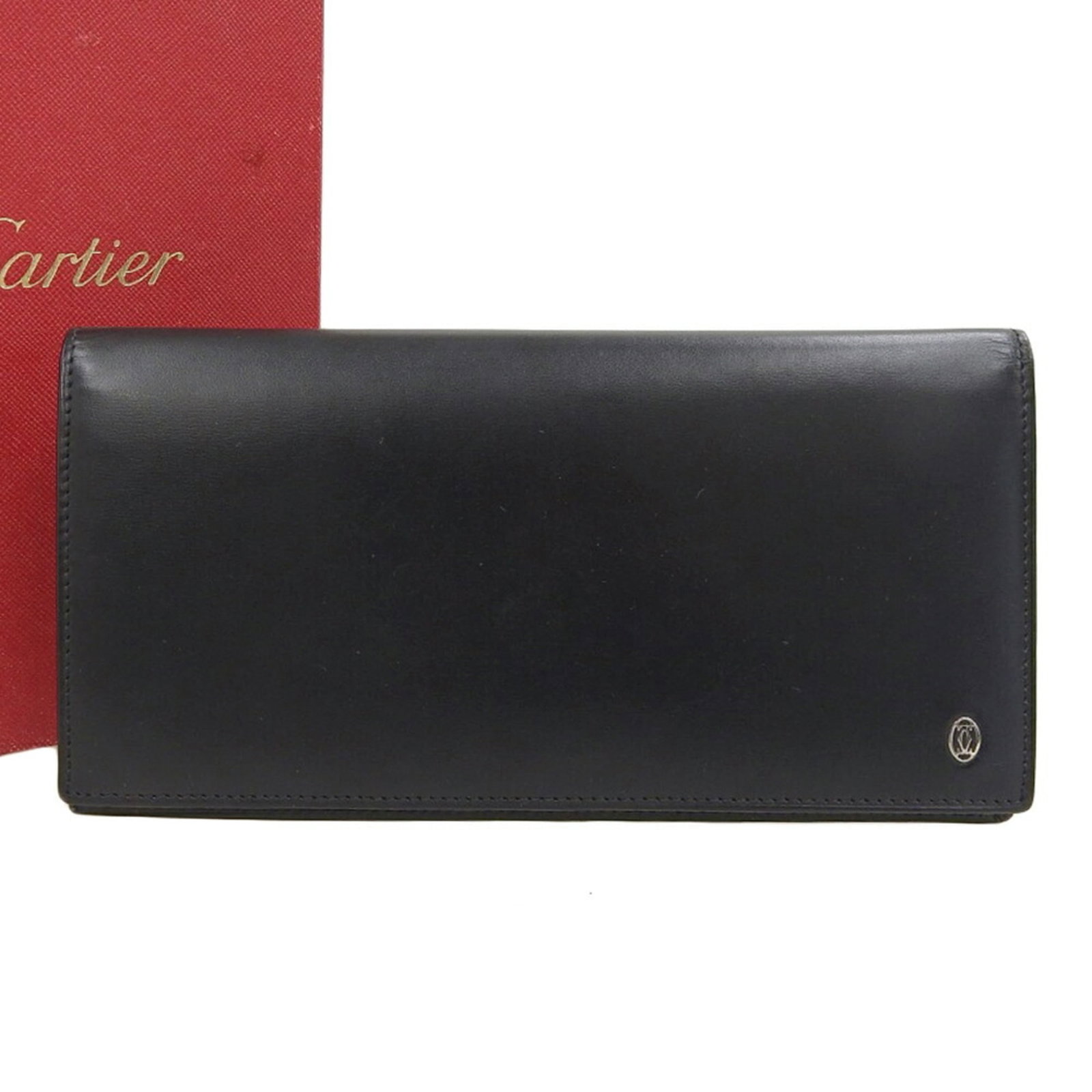 Cartier Bill Wallet (Bi-Fold) Leather: Cartier Bill Wallet (Bi-Fold) Leather Cartier's sleek bi-fold leather wallet boasts a sophisticated black finish, measuring 9cm x 18cm x 1.5cm in size. Crafted from high-quality leather, this elegant 