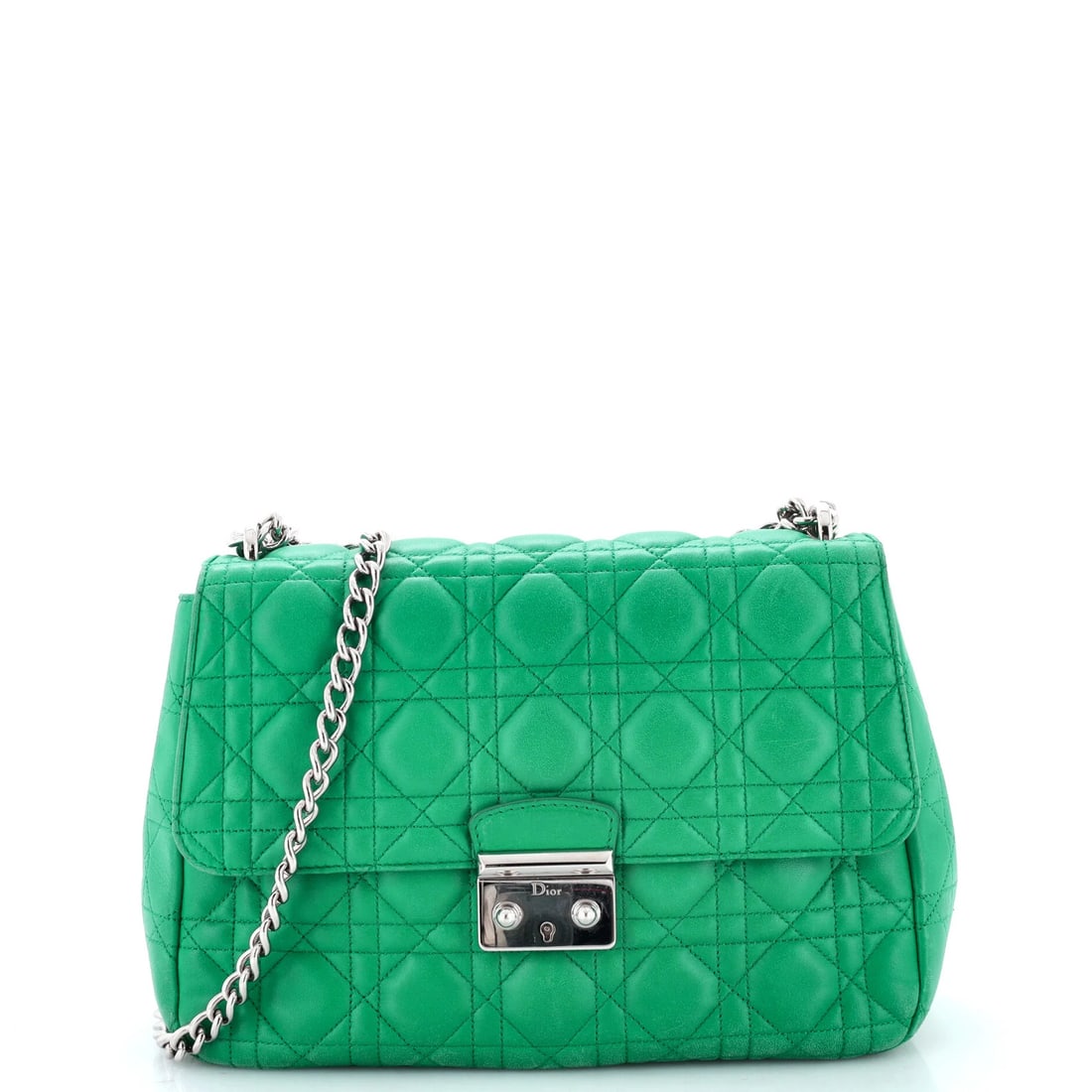 Christian Dior Long Chain Miss Dior Bag Cannage Quilt Lambskin Medium: Christian Dior Long Chain Miss Dior Bag Cannage Quilt Lambskin Medium Christian Dior's Long Chain Miss Dior Bag Cannage Quilt Lambskin Medium boasts a striking green exterior with heavy scuffs and edg