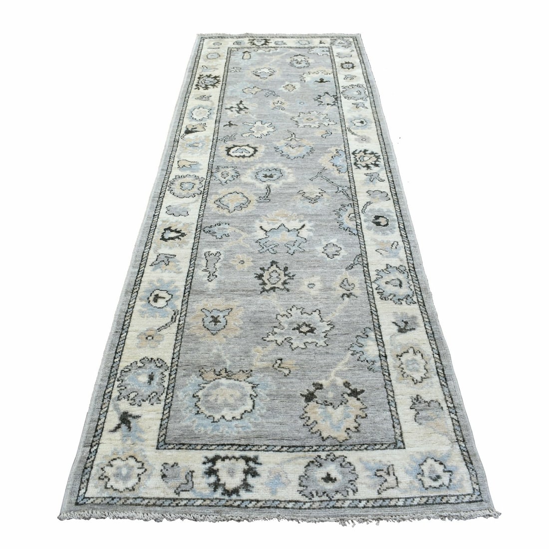3'5"x10'2" Afghan Angora Oushak Wool Hand Knotted Gray Wide Runner Rug: 3'5"x10'2" Afghan Angora Oushak Wool Hand Knotted Gray Wide Runner Rug This stunning Afghan Angora Oushak Wool Hand Knotted Gray Wide Runner Rug measures 3'5" x 10'2" and boasts a rich, grey color. Ma
