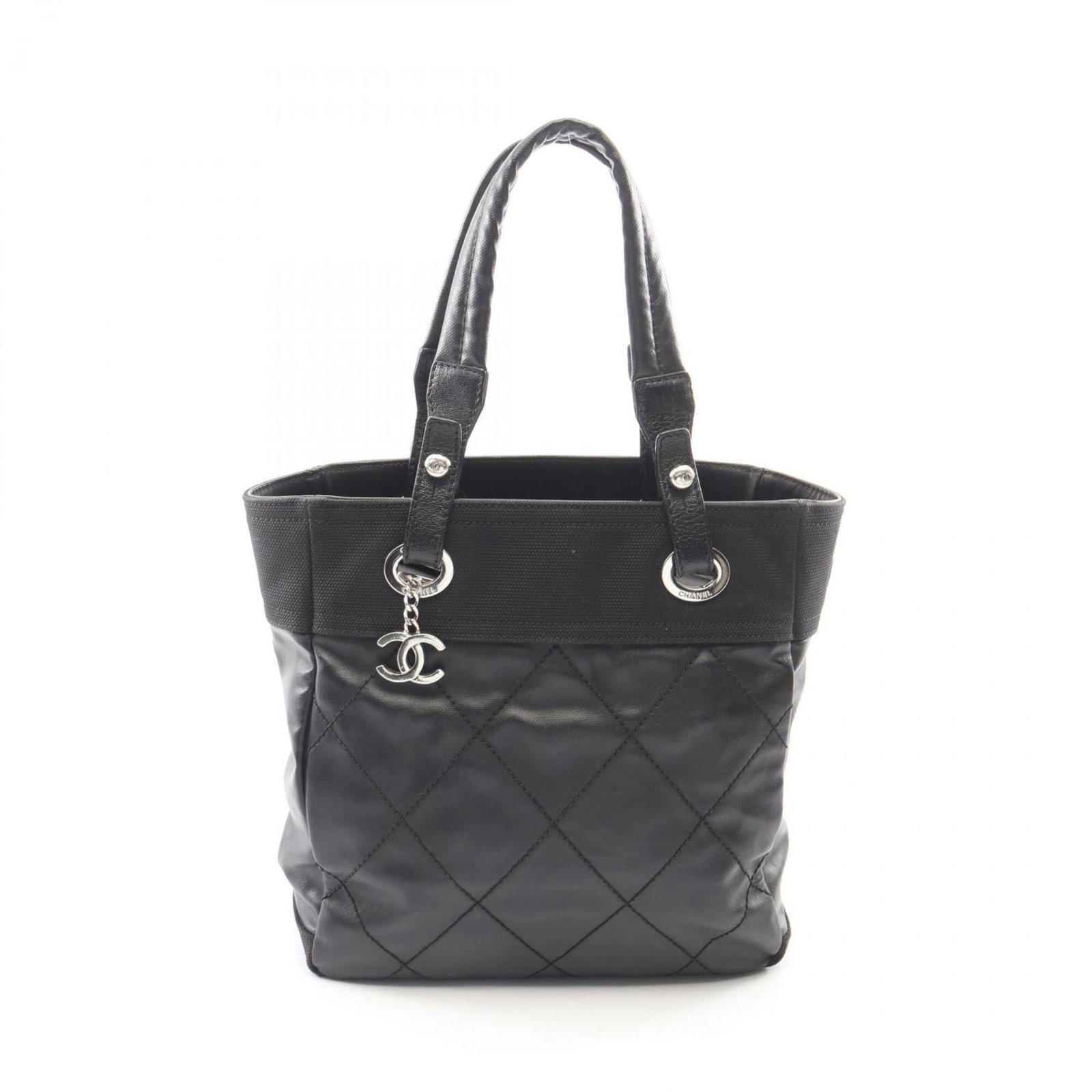 Canvas leather tote bag handbag by Chanel: Canvas leather tote bag handbag by Chanel Item Specifics: Brand: Chanel MPN: A34208 Type: Handbag, Tote bag Material: Coated canvas , Leather Color: Black Gender: Women Size (HxWxD): 27cm x 25cm x 11c