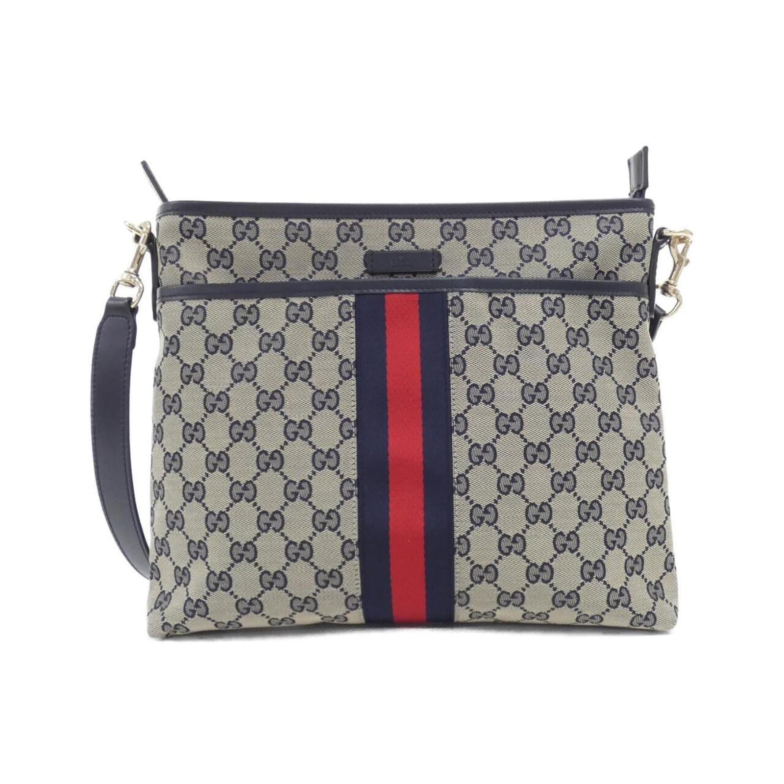 Canvas bag Gucci shoulder: Canvas bag Gucci shoulder Gucci canvas bag with GG logo, featuring a classic shoulder design in beige and blue hues. The bag's signature GG canvas material provides a durable and stylish exterior, whi