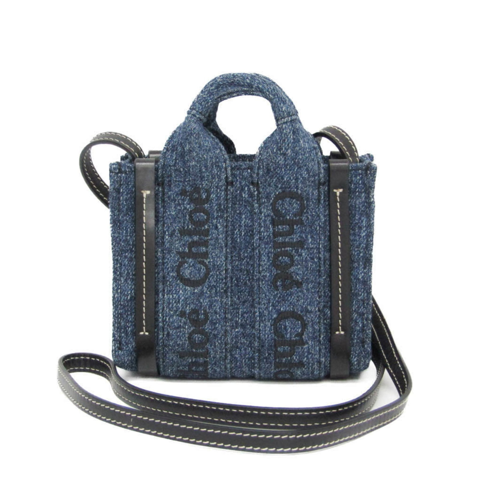 Chlo Handbag Shoulder Bag Denim Leather: Chlo Handbag Shoulder Bag Denim Leather The Chlo Handbag Shoulder Bag Denim Leather features a unique blend of denim and leather materials, with a striking black and blue color combination. Measuring 