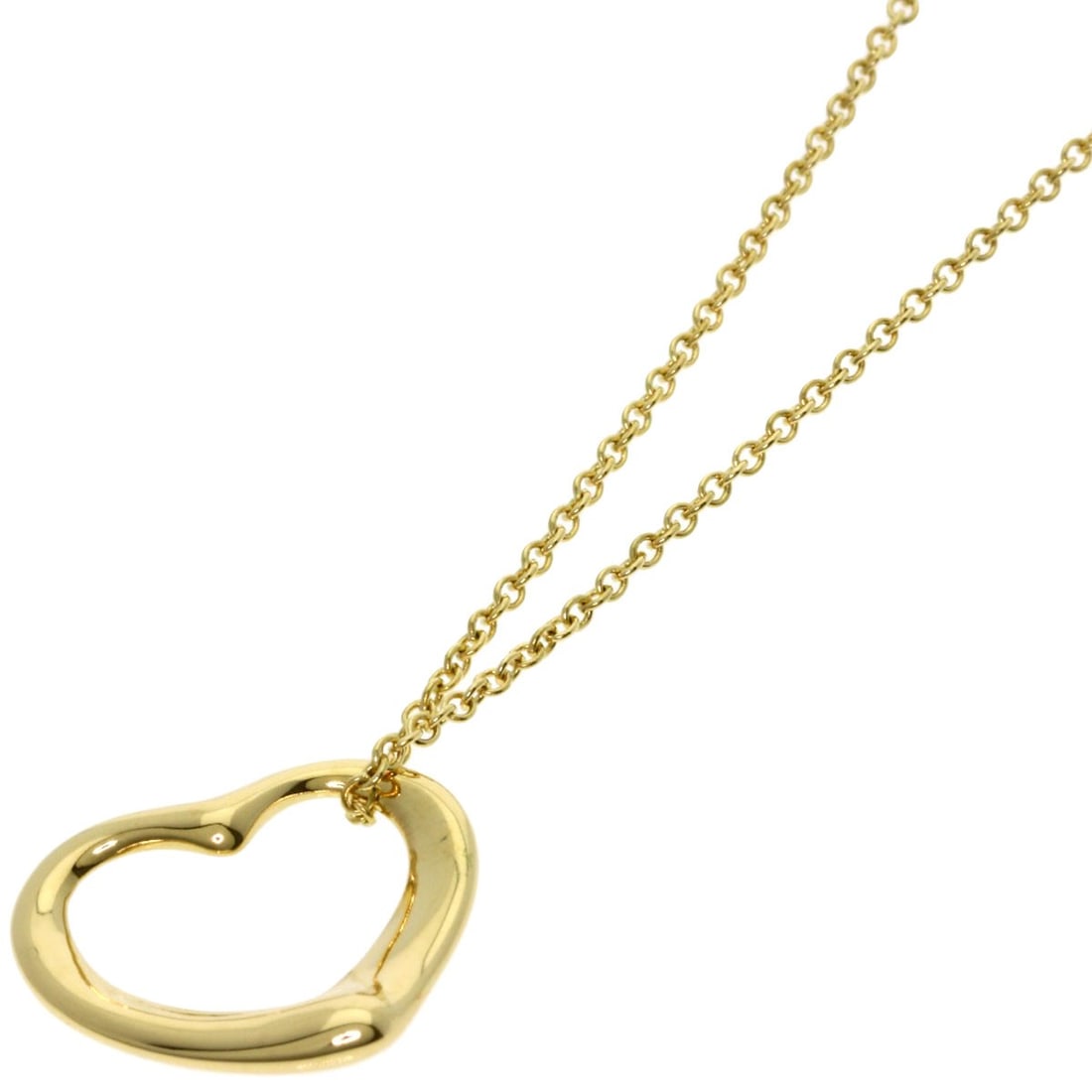 Yellow gold necklace open heart Tiffany Co: Yellow gold necklace open heart Tiffany Co K18 yellow gold necklace with an open heart design from Tiffany & Co. This elegant piece features the iconic brand's signature style and purity, showcasing a