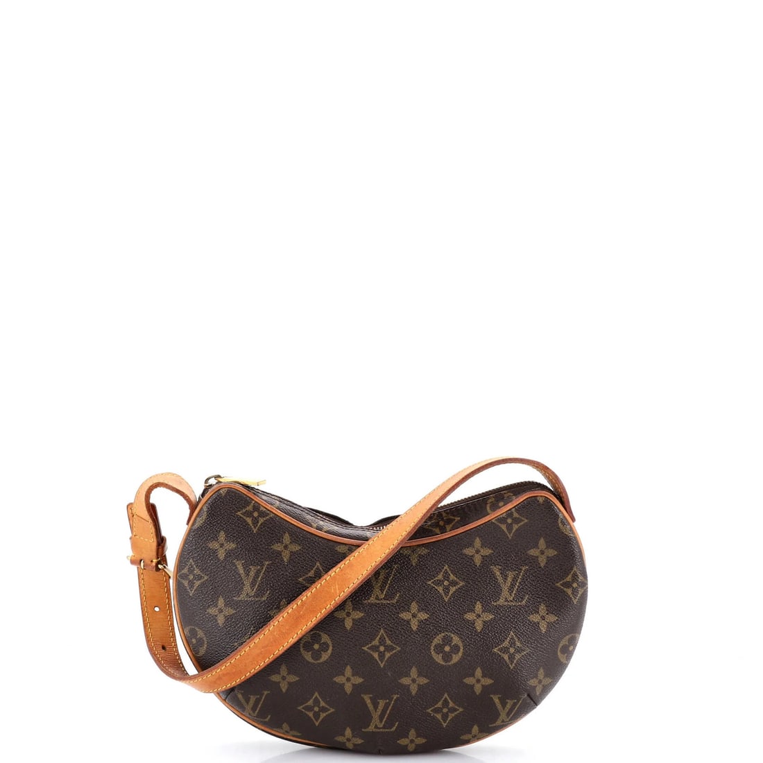 Canvas handbag monogram croissant Louis Vuitton: Canvas handbag monogram croissant Louis Vuitton Canvas handbag monogram croissant Louis Vuitton features a classic brown canvas exterior with subtle edge wear, scuffs, and minor creases. The interior 