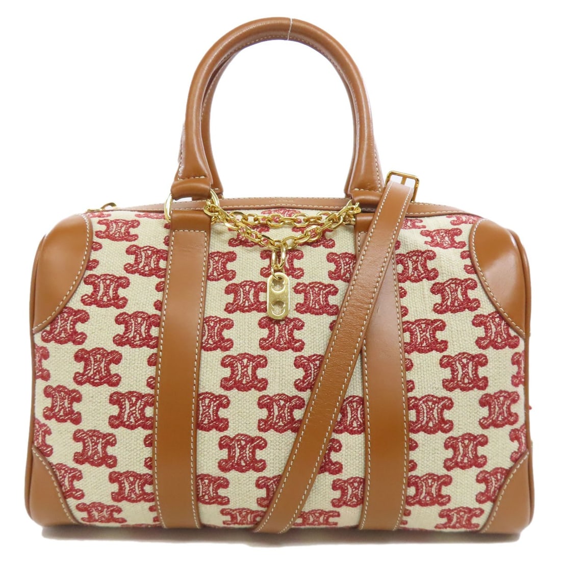 Boston Canvas Triomphe Celine 2Way Bag: Boston Canvas Triomphe Celine 2Way Bag The Boston Canvas Triomphe Celine bag boasts a rich brown canvas exterior, adding a touch of timeless elegance to its classic design. This iconic style features 